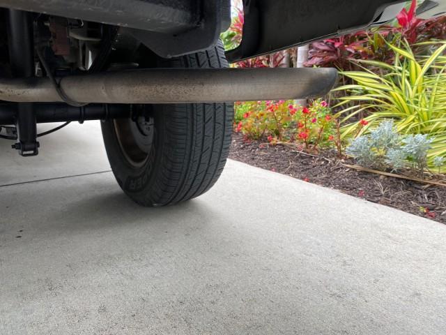 2003 Oxford White /Medium Graphite Ford F-150 XLT SPORT LOW MILES 70,700 1 OWNER (2FTRX17L63C) with an 5.4L 8-Cyl Engine engine, Automatic transmission, located at 4701 North Dixie Hwy, Pompano Beach, FL, 33064, (954) 422-2889, 26.240938, -80.123474 - OUR WEBPAGE FLORIDACARS1.COM HAS OVER 100 PHOTOS AND FREE CARFAX LINK 2003 Ford F-150 XLT 4 Door Extended Cab Pickup 5.4L V8 F SOHC 16V Gasoline 20 MPG Rear Wheel Drive Features ABS Brakes Air Conditioning Alloy Wheels AM/FM Stereo Automatic Transmission Auxiliary Audio Input Bluetooth Technology CD - Photo#95