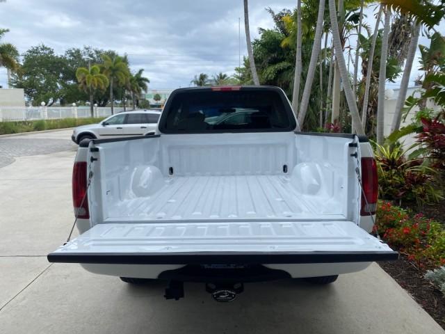 2003 Oxford White /Medium Graphite Ford F-150 XLT SPORT LOW MILES 70,700 1 OWNER (2FTRX17L63C) with an 5.4L 8-Cyl Engine engine, Automatic transmission, located at 4701 North Dixie Hwy, Pompano Beach, FL, 33064, (954) 422-2889, 26.240938, -80.123474 - OUR WEBPAGE FLORIDACARS1.COM HAS OVER 100 PHOTOS AND FREE CARFAX LINK 2003 Ford F-150 XLT 4 Door Extended Cab Pickup 5.4L V8 F SOHC 16V Gasoline 20 MPG Rear Wheel Drive Features ABS Brakes Air Conditioning Alloy Wheels AM/FM Stereo Automatic Transmission Auxiliary Audio Input Bluetooth Technology CD - Photo#96