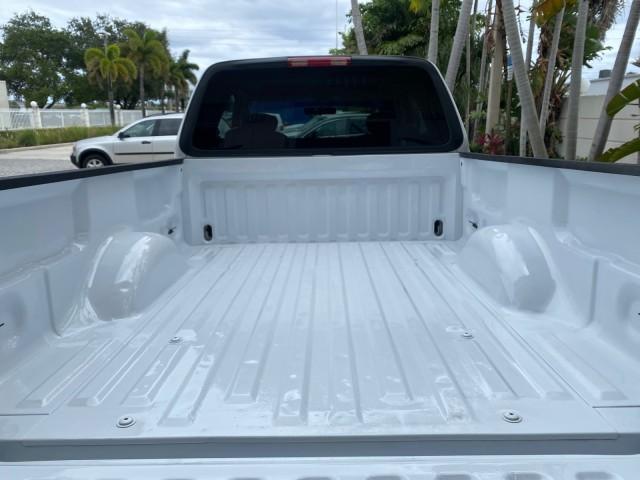 2003 Oxford White /Medium Graphite Ford F-150 XLT SPORT LOW MILES 70,700 1 OWNER (2FTRX17L63C) with an 5.4L 8-Cyl Engine engine, Automatic transmission, located at 4701 North Dixie Hwy, Pompano Beach, FL, 33064, (954) 422-2889, 26.240938, -80.123474 - OUR WEBPAGE FLORIDACARS1.COM HAS OVER 100 PHOTOS AND FREE CARFAX LINK 2003 Ford F-150 XLT 4 Door Extended Cab Pickup 5.4L V8 F SOHC 16V Gasoline 20 MPG Rear Wheel Drive Features ABS Brakes Air Conditioning Alloy Wheels AM/FM Stereo Automatic Transmission Auxiliary Audio Input Bluetooth Technology CD - Photo#98