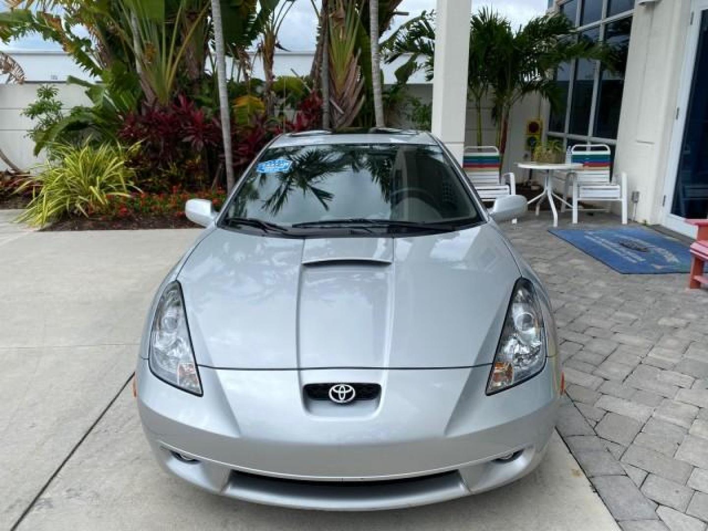 2001 Liquid Silver /Black/Silver Toyota Celica GT COUPE LOW MILES 60,070 (JTDDR32T310) with an 1.8L DOHC MPFI 16-Valve 4-Cyl Engine engine, Automatic transmission, located at 4701 North Dixie Hwy, Pompano Beach, FL, 33064, (954) 422-2889, 26.240938, -80.123474 - OUR WEBPAGE FLORIDACARS1.COM HAS OVER 100 PHOTOS AND FREE CARFAX LINK 2001 Toyota Celica GT Hatchback 2 DR 1.8L I4 F DOHC 16V Gasoline 34 MPG Front Wheel Drive Features Air Conditioning Alloy Wheels AM/FM Stereo Automatic Transmission Cassette Player CD Audio Cloth Seats Cruise Control Power Locks P- Photo#2