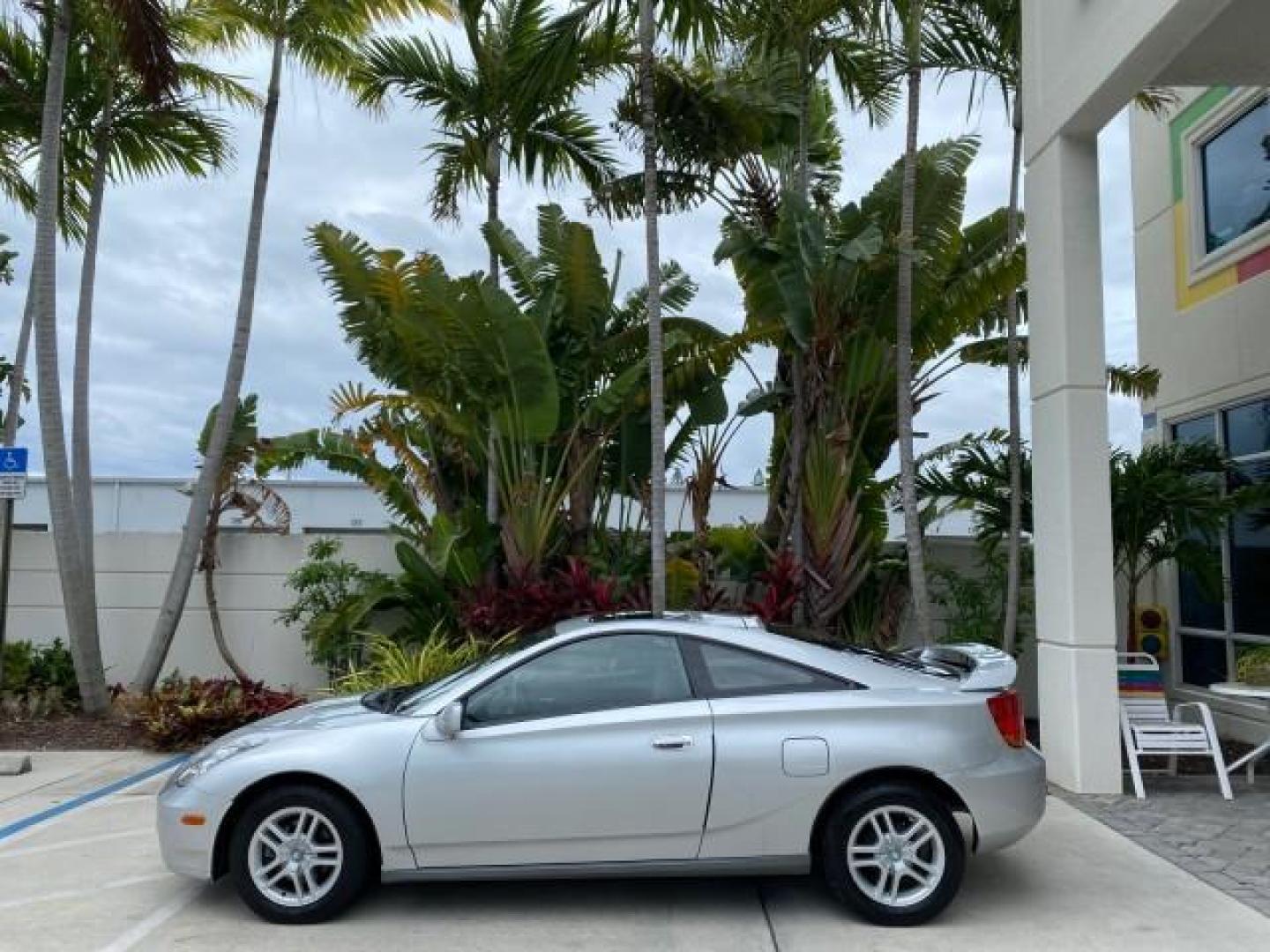 2001 Liquid Silver /Black/Silver Toyota Celica GT COUPE LOW MILES 60,070 (JTDDR32T310) with an 1.8L DOHC MPFI 16-Valve 4-Cyl Engine engine, Automatic transmission, located at 4701 North Dixie Hwy, Pompano Beach, FL, 33064, (954) 422-2889, 26.240938, -80.123474 - OUR WEBPAGE FLORIDACARS1.COM HAS OVER 100 PHOTOS AND FREE CARFAX LINK 2001 Toyota Celica GT Hatchback 2 DR 1.8L I4 F DOHC 16V Gasoline 34 MPG Front Wheel Drive Features Air Conditioning Alloy Wheels AM/FM Stereo Automatic Transmission Cassette Player CD Audio Cloth Seats Cruise Control Power Locks P- Photo#4