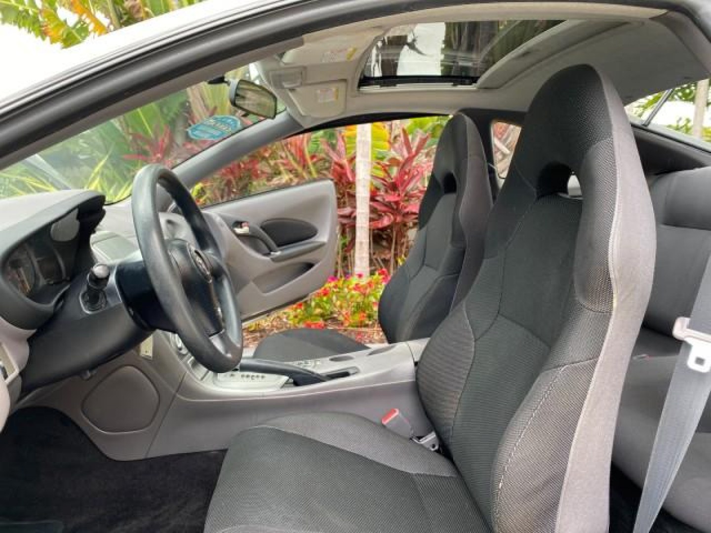 2001 Liquid Silver /Black/Silver Toyota Celica GT COUPE LOW MILES 60,070 (JTDDR32T310) with an 1.8L DOHC MPFI 16-Valve 4-Cyl Engine engine, Automatic transmission, located at 4701 North Dixie Hwy, Pompano Beach, FL, 33064, (954) 422-2889, 26.240938, -80.123474 - OUR WEBPAGE FLORIDACARS1.COM HAS OVER 100 PHOTOS AND FREE CARFAX LINK 2001 Toyota Celica GT Hatchback 2 DR 1.8L I4 F DOHC 16V Gasoline 34 MPG Front Wheel Drive Features Air Conditioning Alloy Wheels AM/FM Stereo Automatic Transmission Cassette Player CD Audio Cloth Seats Cruise Control Power Locks P- Photo#10