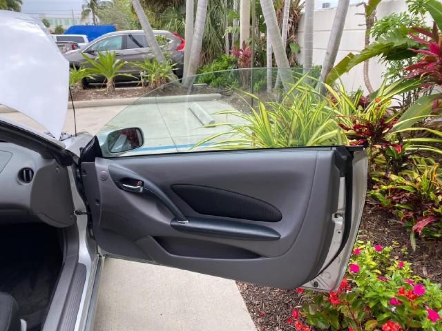 2001 Liquid Silver /Black/Silver Toyota Celica GT COUPE LOW MILES 60,070 (JTDDR32T310) with an 1.8L DOHC MPFI 16-Valve 4-Cyl Engine engine, Automatic transmission, located at 4701 North Dixie Hwy, Pompano Beach, FL, 33064, (954) 422-2889, 26.240938, -80.123474 - OUR WEBPAGE FLORIDACARS1.COM HAS OVER 100 PHOTOS AND FREE CARFAX LINK 2001 Toyota Celica GT Hatchback 2 DR 1.8L I4 F DOHC 16V Gasoline 34 MPG Front Wheel Drive Features Air Conditioning Alloy Wheels AM/FM Stereo Automatic Transmission Cassette Player CD Audio Cloth Seats Cruise Control Power Locks P- Photo#11