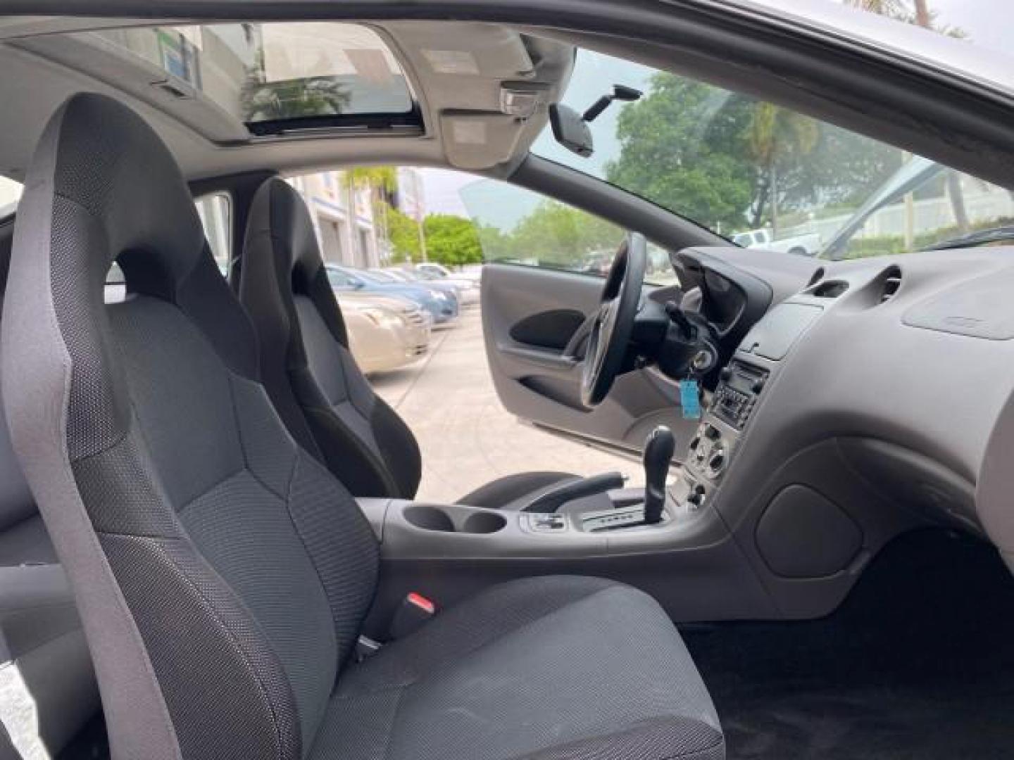 2001 Liquid Silver /Black/Silver Toyota Celica GT COUPE LOW MILES 60,070 (JTDDR32T310) with an 1.8L DOHC MPFI 16-Valve 4-Cyl Engine engine, Automatic transmission, located at 4701 North Dixie Hwy, Pompano Beach, FL, 33064, (954) 422-2889, 26.240938, -80.123474 - OUR WEBPAGE FLORIDACARS1.COM HAS OVER 100 PHOTOS AND FREE CARFAX LINK 2001 Toyota Celica GT Hatchback 2 DR 1.8L I4 F DOHC 16V Gasoline 34 MPG Front Wheel Drive Features Air Conditioning Alloy Wheels AM/FM Stereo Automatic Transmission Cassette Player CD Audio Cloth Seats Cruise Control Power Locks P- Photo#12