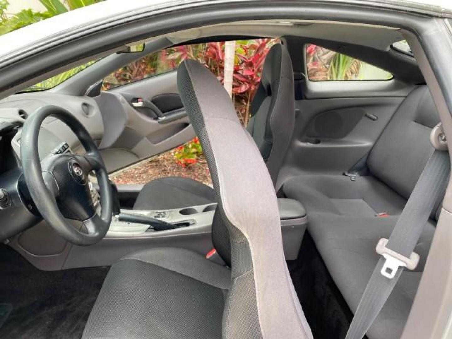 2001 Liquid Silver /Black/Silver Toyota Celica GT COUPE LOW MILES 60,070 (JTDDR32T310) with an 1.8L DOHC MPFI 16-Valve 4-Cyl Engine engine, Automatic transmission, located at 4701 North Dixie Hwy, Pompano Beach, FL, 33064, (954) 422-2889, 26.240938, -80.123474 - OUR WEBPAGE FLORIDACARS1.COM HAS OVER 100 PHOTOS AND FREE CARFAX LINK 2001 Toyota Celica GT Hatchback 2 DR 1.8L I4 F DOHC 16V Gasoline 34 MPG Front Wheel Drive Features Air Conditioning Alloy Wheels AM/FM Stereo Automatic Transmission Cassette Player CD Audio Cloth Seats Cruise Control Power Locks P- Photo#13