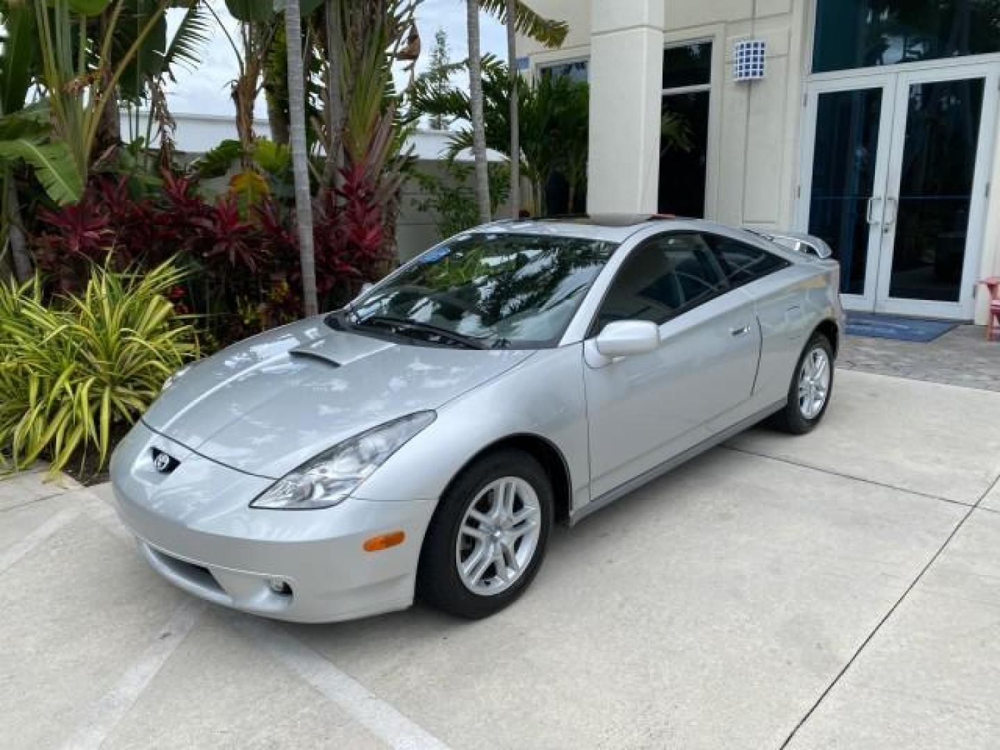 2001 Liquid Silver /Black/Silver Toyota Celica GT COUPE LOW MILES 60,070 (JTDDR32T310) with an 1.8L DOHC MPFI 16-Valve 4-Cyl Engine engine, Automatic transmission, located at 4701 North Dixie Hwy, Pompano Beach, FL, 33064, (954) 422-2889, 26.240938, -80.123474 - OUR WEBPAGE FLORIDACARS1.COM HAS OVER 100 PHOTOS AND FREE CARFAX LINK 2001 Toyota Celica GT Hatchback 2 DR 1.8L I4 F DOHC 16V Gasoline 34 MPG Front Wheel Drive Features Air Conditioning Alloy Wheels AM/FM Stereo Automatic Transmission Cassette Player CD Audio Cloth Seats Cruise Control Power Locks P- Photo#28