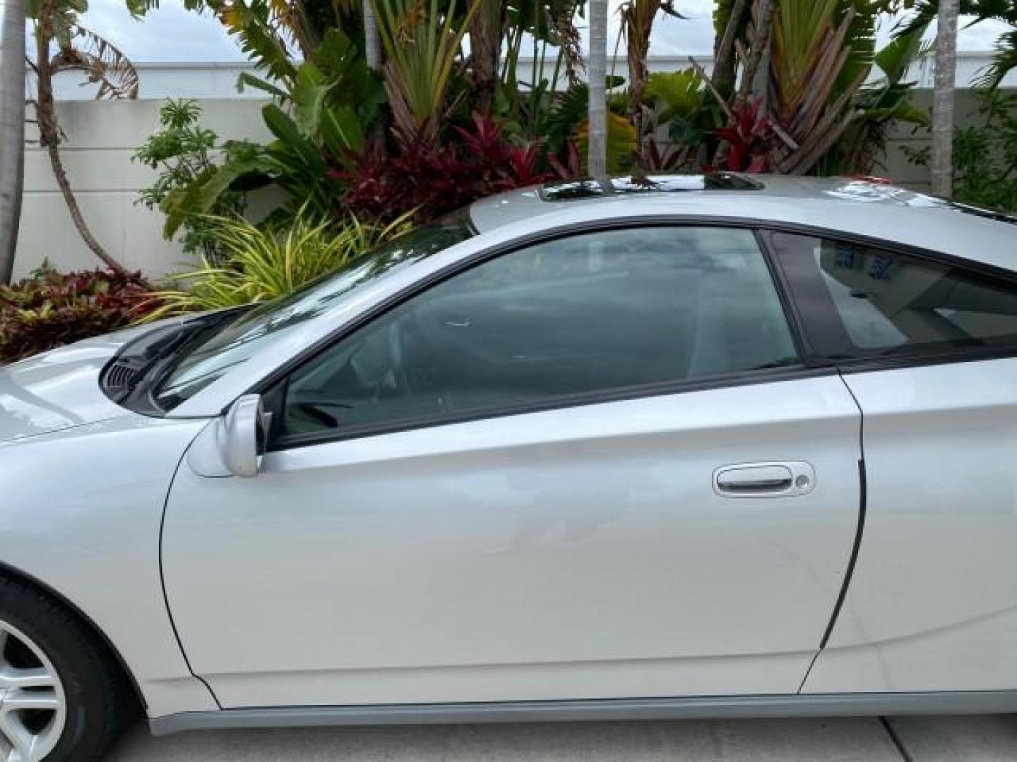 2001 Liquid Silver /Black/Silver Toyota Celica GT COUPE LOW MILES 60,070 (JTDDR32T310) with an 1.8L DOHC MPFI 16-Valve 4-Cyl Engine engine, Automatic transmission, located at 4701 North Dixie Hwy, Pompano Beach, FL, 33064, (954) 422-2889, 26.240938, -80.123474 - OUR WEBPAGE FLORIDACARS1.COM HAS OVER 100 PHOTOS AND FREE CARFAX LINK 2001 Toyota Celica GT Hatchback 2 DR 1.8L I4 F DOHC 16V Gasoline 34 MPG Front Wheel Drive Features Air Conditioning Alloy Wheels AM/FM Stereo Automatic Transmission Cassette Player CD Audio Cloth Seats Cruise Control Power Locks P- Photo#36