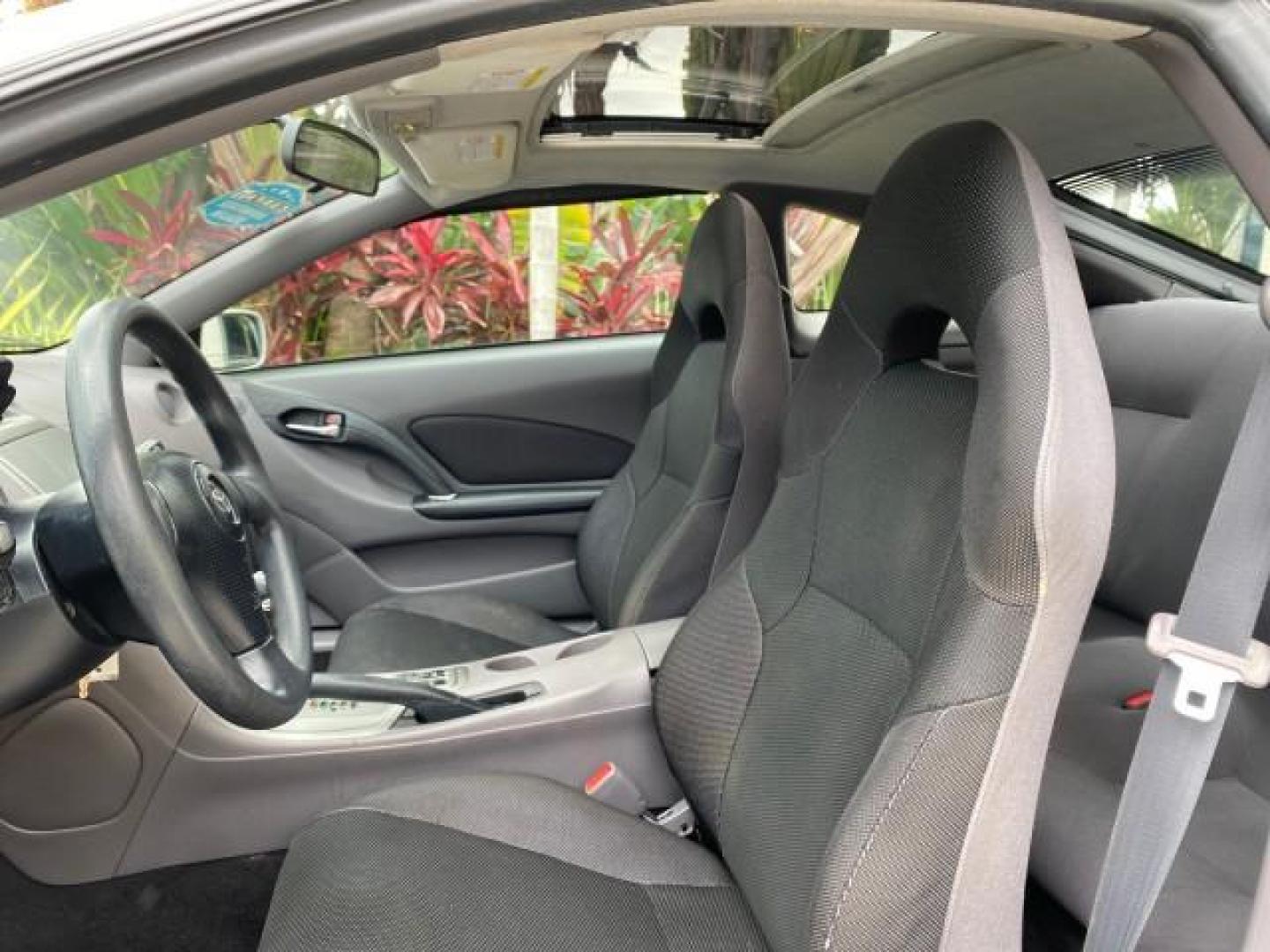 2001 Liquid Silver /Black/Silver Toyota Celica GT COUPE LOW MILES 60,070 (JTDDR32T310) with an 1.8L DOHC MPFI 16-Valve 4-Cyl Engine engine, Automatic transmission, located at 4701 North Dixie Hwy, Pompano Beach, FL, 33064, (954) 422-2889, 26.240938, -80.123474 - OUR WEBPAGE FLORIDACARS1.COM HAS OVER 100 PHOTOS AND FREE CARFAX LINK 2001 Toyota Celica GT Hatchback 2 DR 1.8L I4 F DOHC 16V Gasoline 34 MPG Front Wheel Drive Features Air Conditioning Alloy Wheels AM/FM Stereo Automatic Transmission Cassette Player CD Audio Cloth Seats Cruise Control Power Locks P- Photo#42