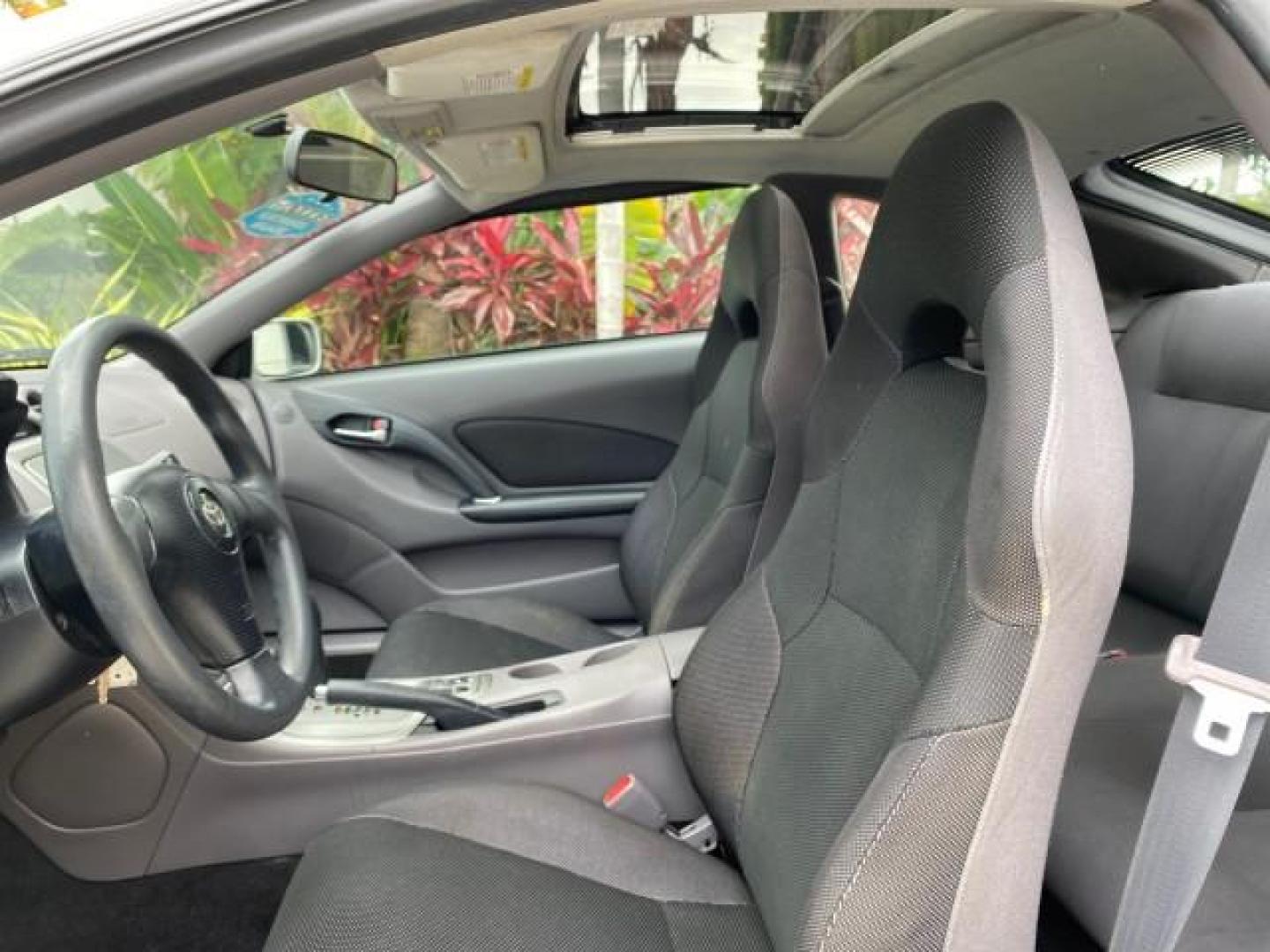 2001 Liquid Silver /Black/Silver Toyota Celica GT COUPE LOW MILES 60,070 (JTDDR32T310) with an 1.8L DOHC MPFI 16-Valve 4-Cyl Engine engine, Automatic transmission, located at 4701 North Dixie Hwy, Pompano Beach, FL, 33064, (954) 422-2889, 26.240938, -80.123474 - OUR WEBPAGE FLORIDACARS1.COM HAS OVER 100 PHOTOS AND FREE CARFAX LINK 2001 Toyota Celica GT Hatchback 2 DR 1.8L I4 F DOHC 16V Gasoline 34 MPG Front Wheel Drive Features Air Conditioning Alloy Wheels AM/FM Stereo Automatic Transmission Cassette Player CD Audio Cloth Seats Cruise Control Power Locks P- Photo#43