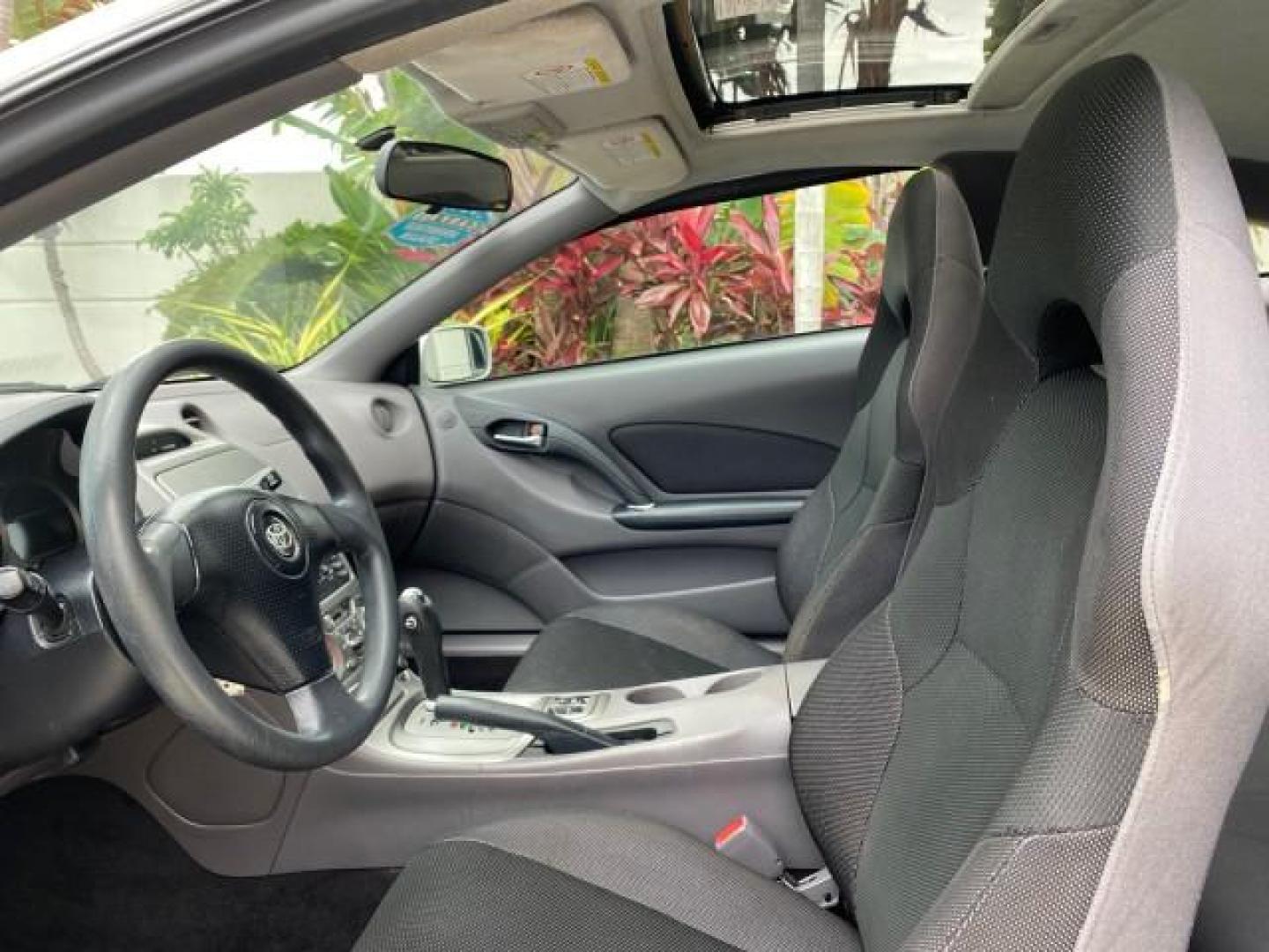 2001 Liquid Silver /Black/Silver Toyota Celica GT COUPE LOW MILES 60,070 (JTDDR32T310) with an 1.8L DOHC MPFI 16-Valve 4-Cyl Engine engine, Automatic transmission, located at 4701 North Dixie Hwy, Pompano Beach, FL, 33064, (954) 422-2889, 26.240938, -80.123474 - OUR WEBPAGE FLORIDACARS1.COM HAS OVER 100 PHOTOS AND FREE CARFAX LINK 2001 Toyota Celica GT Hatchback 2 DR 1.8L I4 F DOHC 16V Gasoline 34 MPG Front Wheel Drive Features Air Conditioning Alloy Wheels AM/FM Stereo Automatic Transmission Cassette Player CD Audio Cloth Seats Cruise Control Power Locks P- Photo#44