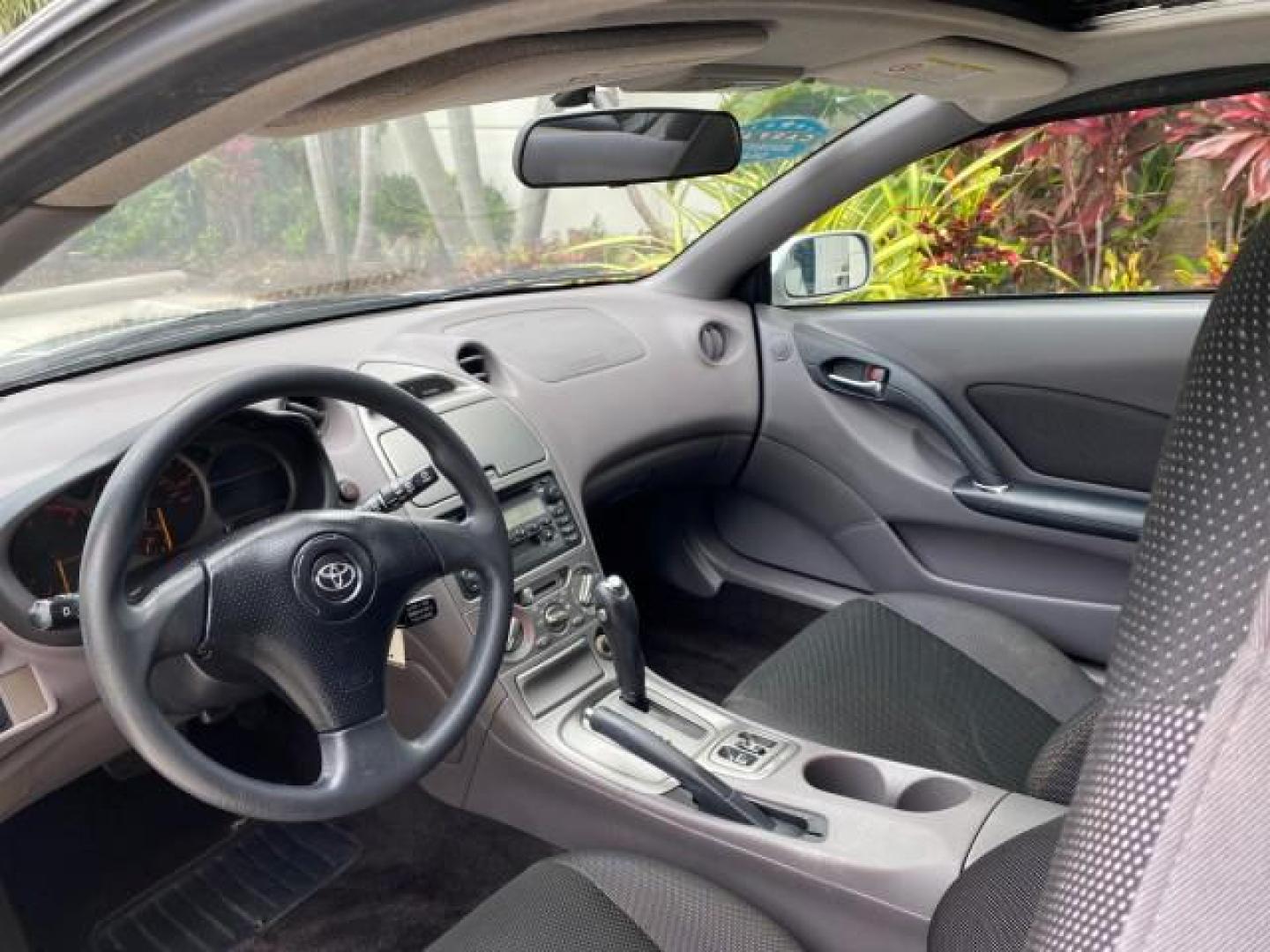 2001 Liquid Silver /Black/Silver Toyota Celica GT COUPE LOW MILES 60,070 (JTDDR32T310) with an 1.8L DOHC MPFI 16-Valve 4-Cyl Engine engine, Automatic transmission, located at 4701 North Dixie Hwy, Pompano Beach, FL, 33064, (954) 422-2889, 26.240938, -80.123474 - OUR WEBPAGE FLORIDACARS1.COM HAS OVER 100 PHOTOS AND FREE CARFAX LINK 2001 Toyota Celica GT Hatchback 2 DR 1.8L I4 F DOHC 16V Gasoline 34 MPG Front Wheel Drive Features Air Conditioning Alloy Wheels AM/FM Stereo Automatic Transmission Cassette Player CD Audio Cloth Seats Cruise Control Power Locks P- Photo#46