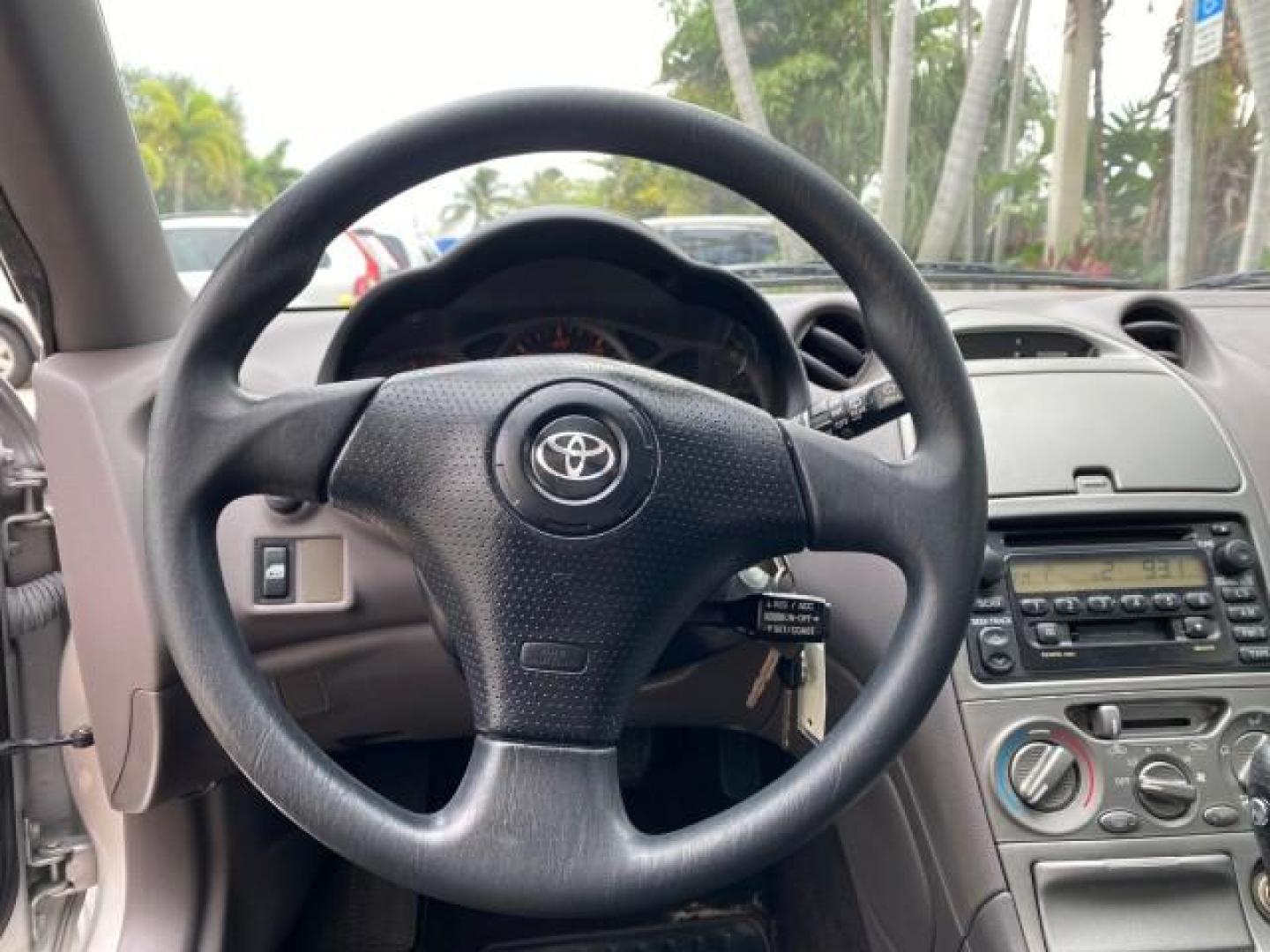 2001 Liquid Silver /Black/Silver Toyota Celica GT COUPE LOW MILES 60,070 (JTDDR32T310) with an 1.8L DOHC MPFI 16-Valve 4-Cyl Engine engine, Automatic transmission, located at 4701 North Dixie Hwy, Pompano Beach, FL, 33064, (954) 422-2889, 26.240938, -80.123474 - OUR WEBPAGE FLORIDACARS1.COM HAS OVER 100 PHOTOS AND FREE CARFAX LINK 2001 Toyota Celica GT Hatchback 2 DR 1.8L I4 F DOHC 16V Gasoline 34 MPG Front Wheel Drive Features Air Conditioning Alloy Wheels AM/FM Stereo Automatic Transmission Cassette Player CD Audio Cloth Seats Cruise Control Power Locks P- Photo#47
