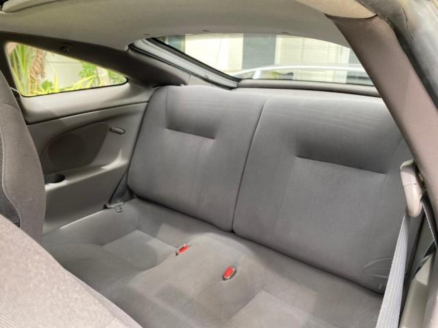 2001 Liquid Silver /Black/Silver Toyota Celica GT COUPE LOW MILES 60,070 (JTDDR32T310) with an 1.8L DOHC MPFI 16-Valve 4-Cyl Engine engine, Automatic transmission, located at 4701 North Dixie Hwy, Pompano Beach, FL, 33064, (954) 422-2889, 26.240938, -80.123474 - OUR WEBPAGE FLORIDACARS1.COM HAS OVER 100 PHOTOS AND FREE CARFAX LINK 2001 Toyota Celica GT Hatchback 2 DR 1.8L I4 F DOHC 16V Gasoline 34 MPG Front Wheel Drive Features Air Conditioning Alloy Wheels AM/FM Stereo Automatic Transmission Cassette Player CD Audio Cloth Seats Cruise Control Power Locks P- Photo#76