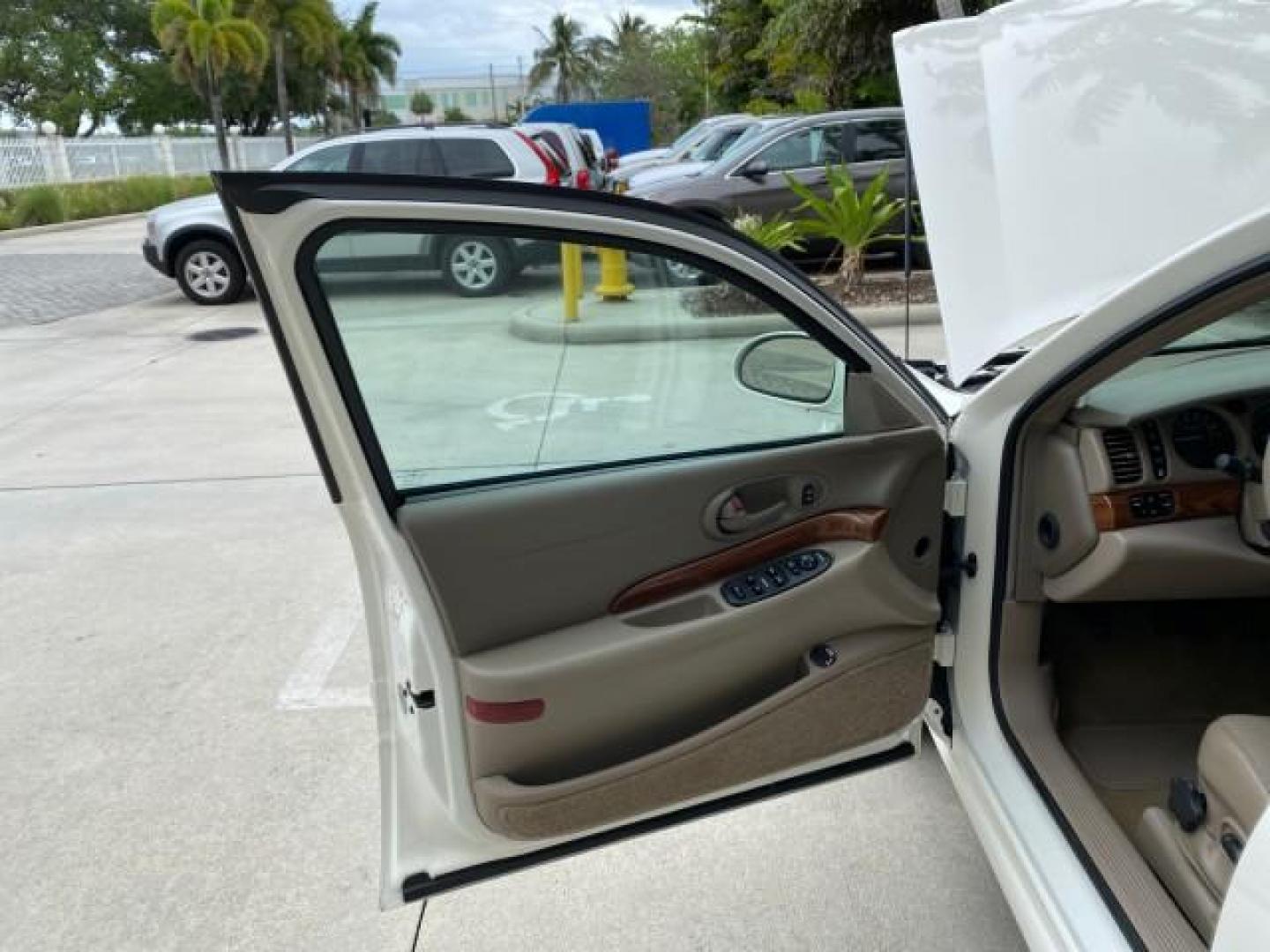 2003 White /Taupe Buick LeSabre LEATHER LOADED LOW MILES 25,425 (1G4HP52K034) with an 3.8L 3800 V6 SFI Engine engine, Automatic transmission, located at 4701 North Dixie Hwy, Pompano Beach, FL, 33064, (954) 422-2889, 26.240938, -80.123474 - OUR WEBPAGE FLORIDACARS1.COM HAS OVER 100 PHOTOS AND FREE CARFAX LINK 2003 Buick Lesabre Custom Sedan 4 DR 3.8L V6 F 12V Gasoline 29 MPG Front Wheel Drive Features ABS Brakes Air Conditioning AM/FM Stereo Automatic Transmission Cassette Player CD Audio Cruise Control Leather Seats Power Locks Power- Photo#8