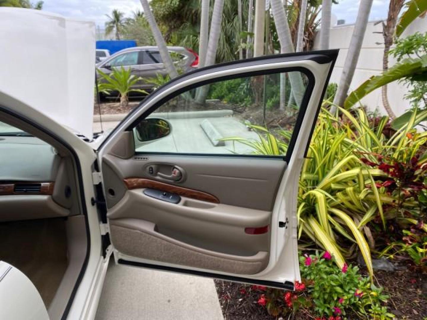 2003 White /Taupe Buick LeSabre LEATHER LOADED LOW MILES 25,425 (1G4HP52K034) with an 3.8L 3800 V6 SFI Engine engine, Automatic transmission, located at 4701 North Dixie Hwy, Pompano Beach, FL, 33064, (954) 422-2889, 26.240938, -80.123474 - OUR WEBPAGE FLORIDACARS1.COM HAS OVER 100 PHOTOS AND FREE CARFAX LINK 2003 Buick Lesabre Custom Sedan 4 DR 3.8L V6 F 12V Gasoline 29 MPG Front Wheel Drive Features ABS Brakes Air Conditioning AM/FM Stereo Automatic Transmission Cassette Player CD Audio Cruise Control Leather Seats Power Locks Power- Photo#10