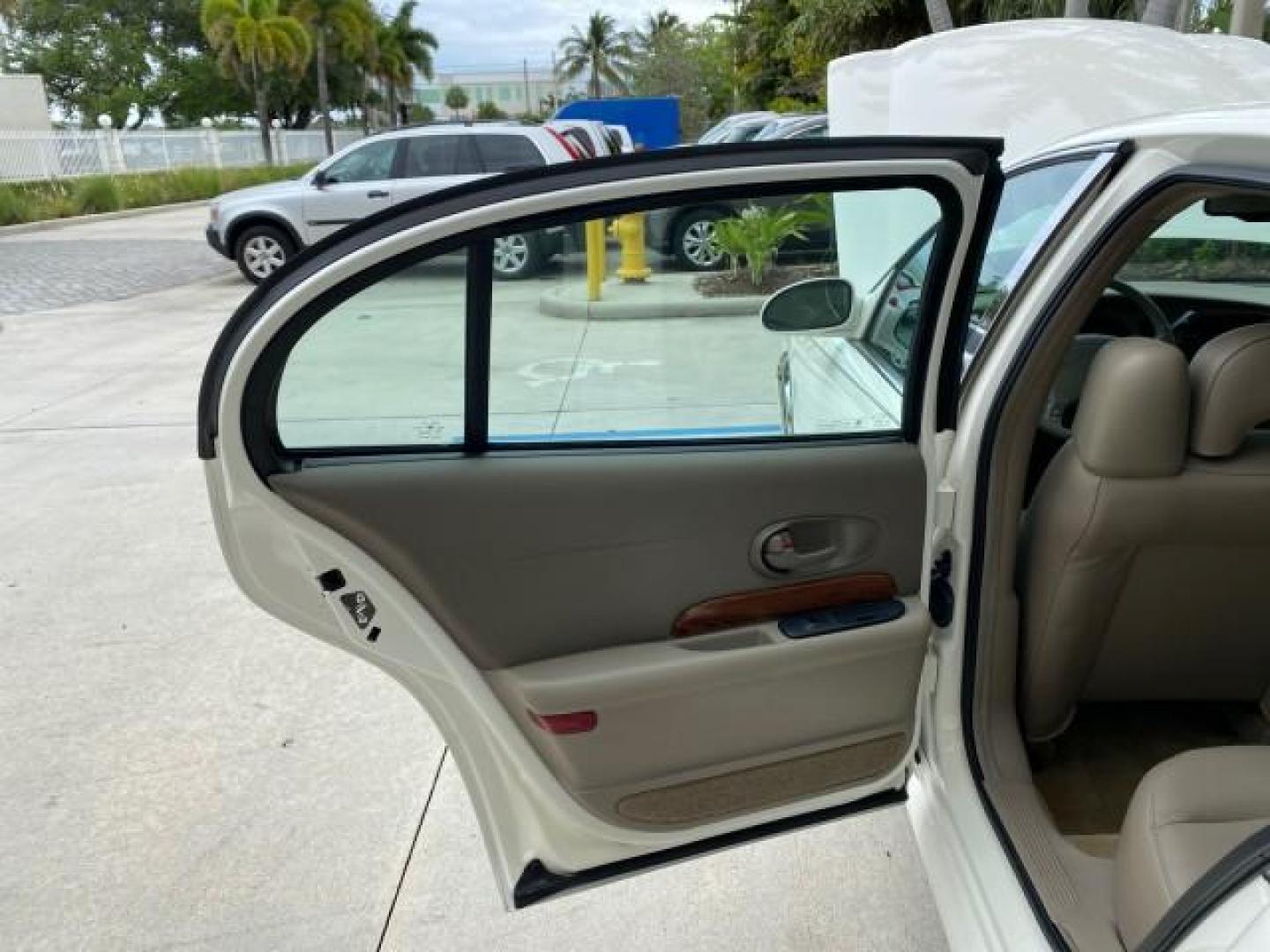 2003 White /Taupe Buick LeSabre LEATHER LOADED LOW MILES 25,425 (1G4HP52K034) with an 3.8L 3800 V6 SFI Engine engine, Automatic transmission, located at 4701 North Dixie Hwy, Pompano Beach, FL, 33064, (954) 422-2889, 26.240938, -80.123474 - OUR WEBPAGE FLORIDACARS1.COM HAS OVER 100 PHOTOS AND FREE CARFAX LINK 2003 Buick Lesabre Custom Sedan 4 DR 3.8L V6 F 12V Gasoline 29 MPG Front Wheel Drive Features ABS Brakes Air Conditioning AM/FM Stereo Automatic Transmission Cassette Player CD Audio Cruise Control Leather Seats Power Locks Power- Photo#12