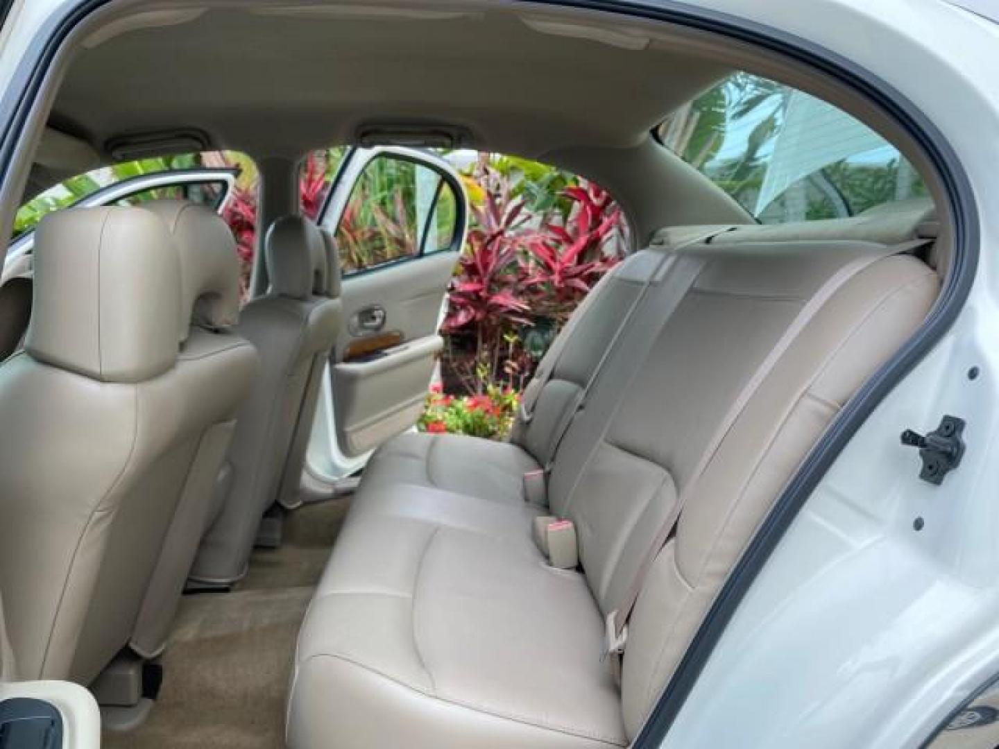 2003 White /Taupe Buick LeSabre LEATHER LOADED LOW MILES 25,425 (1G4HP52K034) with an 3.8L 3800 V6 SFI Engine engine, Automatic transmission, located at 4701 North Dixie Hwy, Pompano Beach, FL, 33064, (954) 422-2889, 26.240938, -80.123474 - OUR WEBPAGE FLORIDACARS1.COM HAS OVER 100 PHOTOS AND FREE CARFAX LINK 2003 Buick Lesabre Custom Sedan 4 DR 3.8L V6 F 12V Gasoline 29 MPG Front Wheel Drive Features ABS Brakes Air Conditioning AM/FM Stereo Automatic Transmission Cassette Player CD Audio Cruise Control Leather Seats Power Locks Power- Photo#13