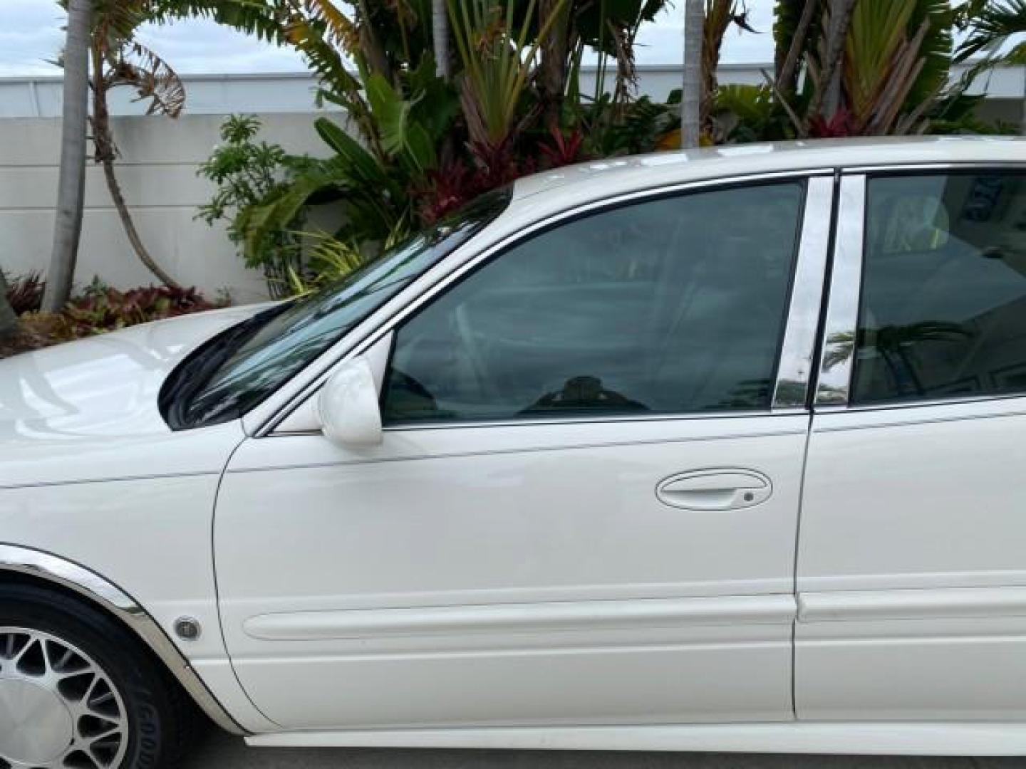 2003 White /Taupe Buick LeSabre LEATHER LOADED LOW MILES 25,425 (1G4HP52K034) with an 3.8L 3800 V6 SFI Engine engine, Automatic transmission, located at 4701 North Dixie Hwy, Pompano Beach, FL, 33064, (954) 422-2889, 26.240938, -80.123474 - OUR WEBPAGE FLORIDACARS1.COM HAS OVER 100 PHOTOS AND FREE CARFAX LINK 2003 Buick Lesabre Custom Sedan 4 DR 3.8L V6 F 12V Gasoline 29 MPG Front Wheel Drive Features ABS Brakes Air Conditioning AM/FM Stereo Automatic Transmission Cassette Player CD Audio Cruise Control Leather Seats Power Locks Power- Photo#36