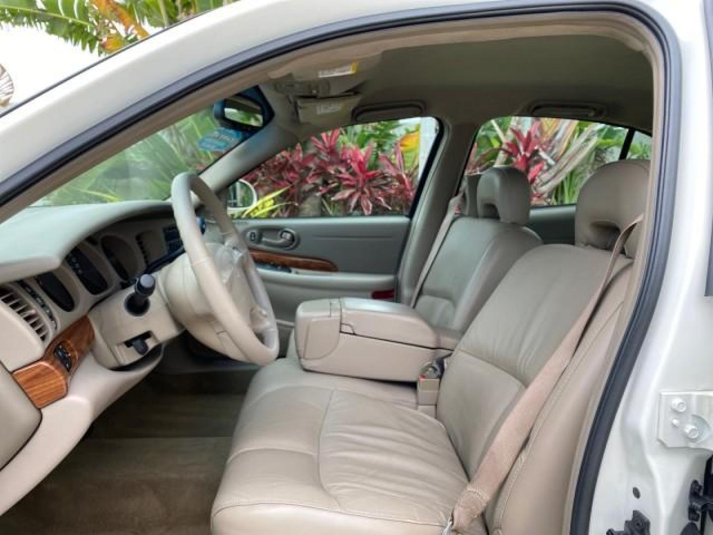 2003 White /Taupe Buick LeSabre LEATHER LOADED LOW MILES 25,425 (1G4HP52K034) with an 3.8L 3800 V6 SFI Engine engine, Automatic transmission, located at 4701 North Dixie Hwy, Pompano Beach, FL, 33064, (954) 422-2889, 26.240938, -80.123474 - OUR WEBPAGE FLORIDACARS1.COM HAS OVER 100 PHOTOS AND FREE CARFAX LINK 2003 Buick Lesabre Custom Sedan 4 DR 3.8L V6 F 12V Gasoline 29 MPG Front Wheel Drive Features ABS Brakes Air Conditioning AM/FM Stereo Automatic Transmission Cassette Player CD Audio Cruise Control Leather Seats Power Locks Power- Photo#42
