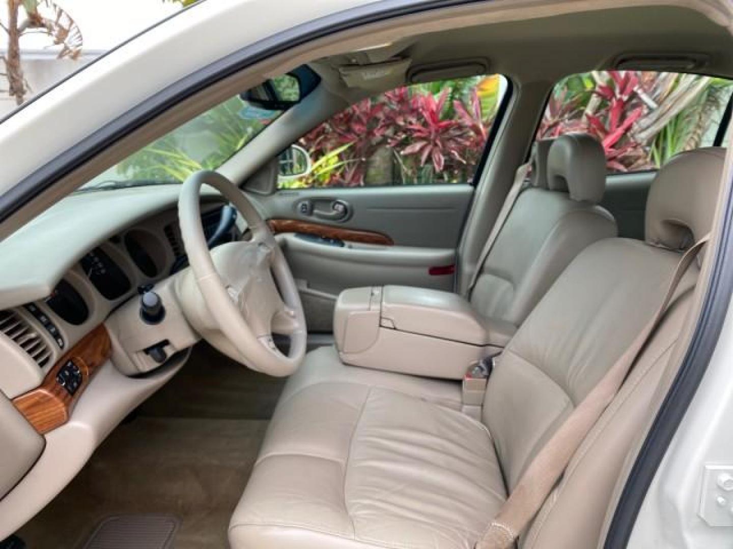 2003 White /Taupe Buick LeSabre LEATHER LOADED LOW MILES 25,425 (1G4HP52K034) with an 3.8L 3800 V6 SFI Engine engine, Automatic transmission, located at 4701 North Dixie Hwy, Pompano Beach, FL, 33064, (954) 422-2889, 26.240938, -80.123474 - OUR WEBPAGE FLORIDACARS1.COM HAS OVER 100 PHOTOS AND FREE CARFAX LINK 2003 Buick Lesabre Custom Sedan 4 DR 3.8L V6 F 12V Gasoline 29 MPG Front Wheel Drive Features ABS Brakes Air Conditioning AM/FM Stereo Automatic Transmission Cassette Player CD Audio Cruise Control Leather Seats Power Locks Power- Photo#43