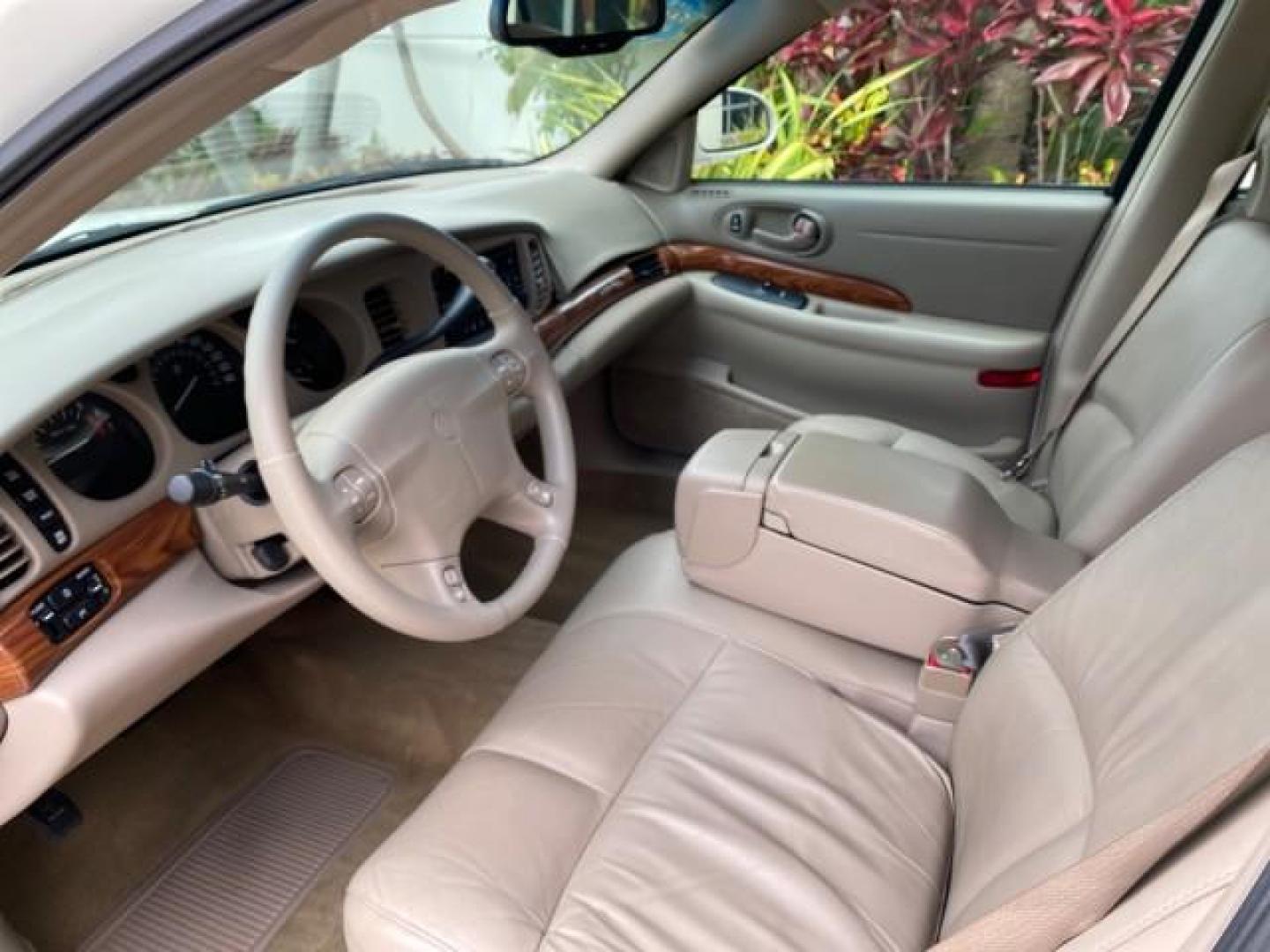 2003 White /Taupe Buick LeSabre LEATHER LOADED LOW MILES 25,425 (1G4HP52K034) with an 3.8L 3800 V6 SFI Engine engine, Automatic transmission, located at 4701 North Dixie Hwy, Pompano Beach, FL, 33064, (954) 422-2889, 26.240938, -80.123474 - OUR WEBPAGE FLORIDACARS1.COM HAS OVER 100 PHOTOS AND FREE CARFAX LINK 2003 Buick Lesabre Custom Sedan 4 DR 3.8L V6 F 12V Gasoline 29 MPG Front Wheel Drive Features ABS Brakes Air Conditioning AM/FM Stereo Automatic Transmission Cassette Player CD Audio Cruise Control Leather Seats Power Locks Power- Photo#44