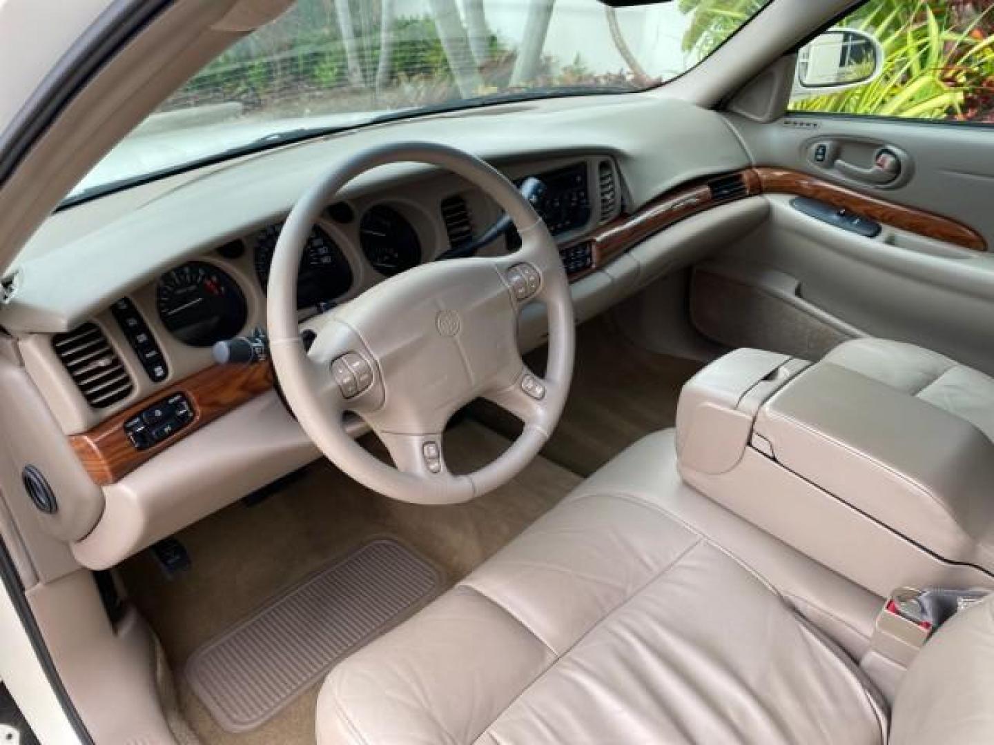 2003 White /Taupe Buick LeSabre LEATHER LOADED LOW MILES 25,425 (1G4HP52K034) with an 3.8L 3800 V6 SFI Engine engine, Automatic transmission, located at 4701 North Dixie Hwy, Pompano Beach, FL, 33064, (954) 422-2889, 26.240938, -80.123474 - OUR WEBPAGE FLORIDACARS1.COM HAS OVER 100 PHOTOS AND FREE CARFAX LINK 2003 Buick Lesabre Custom Sedan 4 DR 3.8L V6 F 12V Gasoline 29 MPG Front Wheel Drive Features ABS Brakes Air Conditioning AM/FM Stereo Automatic Transmission Cassette Player CD Audio Cruise Control Leather Seats Power Locks Power- Photo#46