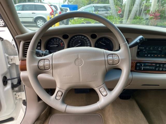 2003 White /Taupe Buick LeSabre LEATHER LOADED LOW MILES 25,425 (1G4HP52K034) with an 3.8L 3800 V6 SFI Engine engine, Automatic transmission, located at 4701 North Dixie Hwy, Pompano Beach, FL, 33064, (954) 422-2889, 26.240938, -80.123474 - OUR WEBPAGE FLORIDACARS1.COM HAS OVER 100 PHOTOS AND FREE CARFAX LINK 2003 Buick Lesabre Custom Sedan 4 DR 3.8L V6 F 12V Gasoline 29 MPG Front Wheel Drive Features ABS Brakes Air Conditioning AM/FM Stereo Automatic Transmission Cassette Player CD Audio Cruise Control Leather Seats Power Locks Power - Photo#47