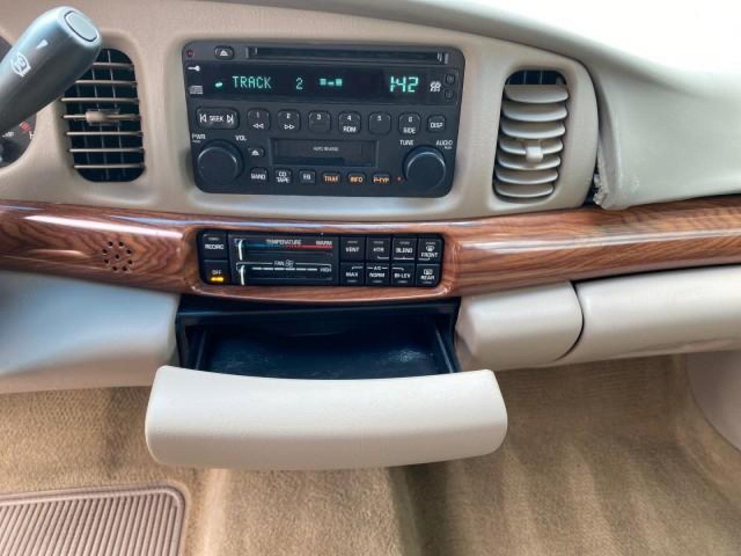 2003 White /Taupe Buick LeSabre LEATHER LOADED LOW MILES 25,425 (1G4HP52K034) with an 3.8L 3800 V6 SFI Engine engine, Automatic transmission, located at 4701 North Dixie Hwy, Pompano Beach, FL, 33064, (954) 422-2889, 26.240938, -80.123474 - OUR WEBPAGE FLORIDACARS1.COM HAS OVER 100 PHOTOS AND FREE CARFAX LINK 2003 Buick Lesabre Custom Sedan 4 DR 3.8L V6 F 12V Gasoline 29 MPG Front Wheel Drive Features ABS Brakes Air Conditioning AM/FM Stereo Automatic Transmission Cassette Player CD Audio Cruise Control Leather Seats Power Locks Power- Photo#61