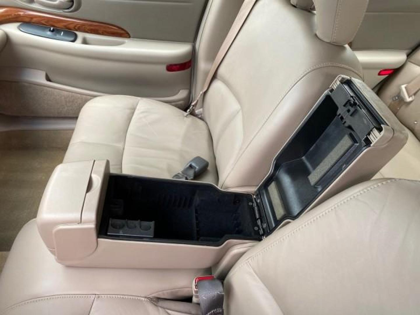2003 White /Taupe Buick LeSabre LEATHER LOADED LOW MILES 25,425 (1G4HP52K034) with an 3.8L 3800 V6 SFI Engine engine, Automatic transmission, located at 4701 North Dixie Hwy, Pompano Beach, FL, 33064, (954) 422-2889, 26.240938, -80.123474 - OUR WEBPAGE FLORIDACARS1.COM HAS OVER 100 PHOTOS AND FREE CARFAX LINK 2003 Buick Lesabre Custom Sedan 4 DR 3.8L V6 F 12V Gasoline 29 MPG Front Wheel Drive Features ABS Brakes Air Conditioning AM/FM Stereo Automatic Transmission Cassette Player CD Audio Cruise Control Leather Seats Power Locks Power- Photo#66