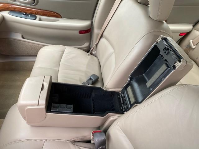 2003 White /Taupe Buick LeSabre LEATHER LOADED LOW MILES 25,425 (1G4HP52K034) with an 3.8L 3800 V6 SFI Engine engine, Automatic transmission, located at 4701 North Dixie Hwy, Pompano Beach, FL, 33064, (954) 422-2889, 26.240938, -80.123474 - OUR WEBPAGE FLORIDACARS1.COM HAS OVER 100 PHOTOS AND FREE CARFAX LINK 2003 Buick Lesabre Custom Sedan 4 DR 3.8L V6 F 12V Gasoline 29 MPG Front Wheel Drive Features ABS Brakes Air Conditioning AM/FM Stereo Automatic Transmission Cassette Player CD Audio Cruise Control Leather Seats Power Locks Power - Photo#66
