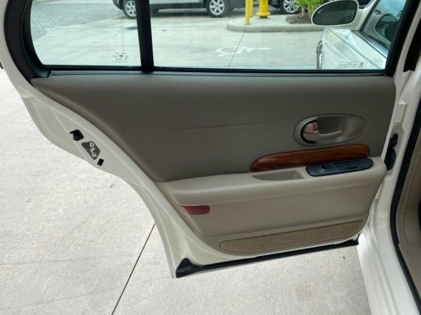 2003 White /Taupe Buick LeSabre LEATHER LOADED LOW MILES 25,425 (1G4HP52K034) with an 3.8L 3800 V6 SFI Engine engine, Automatic transmission, located at 4701 North Dixie Hwy, Pompano Beach, FL, 33064, (954) 422-2889, 26.240938, -80.123474 - OUR WEBPAGE FLORIDACARS1.COM HAS OVER 100 PHOTOS AND FREE CARFAX LINK 2003 Buick Lesabre Custom Sedan 4 DR 3.8L V6 F 12V Gasoline 29 MPG Front Wheel Drive Features ABS Brakes Air Conditioning AM/FM Stereo Automatic Transmission Cassette Player CD Audio Cruise Control Leather Seats Power Locks Power- Photo#71