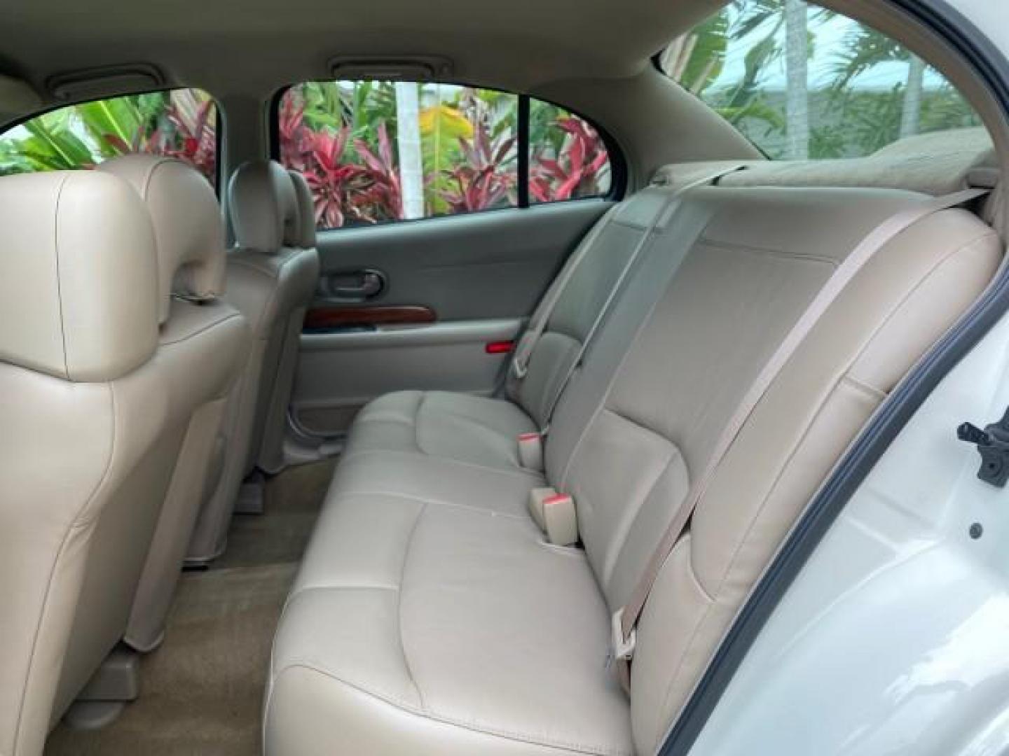 2003 White /Taupe Buick LeSabre LEATHER LOADED LOW MILES 25,425 (1G4HP52K034) with an 3.8L 3800 V6 SFI Engine engine, Automatic transmission, located at 4701 North Dixie Hwy, Pompano Beach, FL, 33064, (954) 422-2889, 26.240938, -80.123474 - OUR WEBPAGE FLORIDACARS1.COM HAS OVER 100 PHOTOS AND FREE CARFAX LINK 2003 Buick Lesabre Custom Sedan 4 DR 3.8L V6 F 12V Gasoline 29 MPG Front Wheel Drive Features ABS Brakes Air Conditioning AM/FM Stereo Automatic Transmission Cassette Player CD Audio Cruise Control Leather Seats Power Locks Power- Photo#72