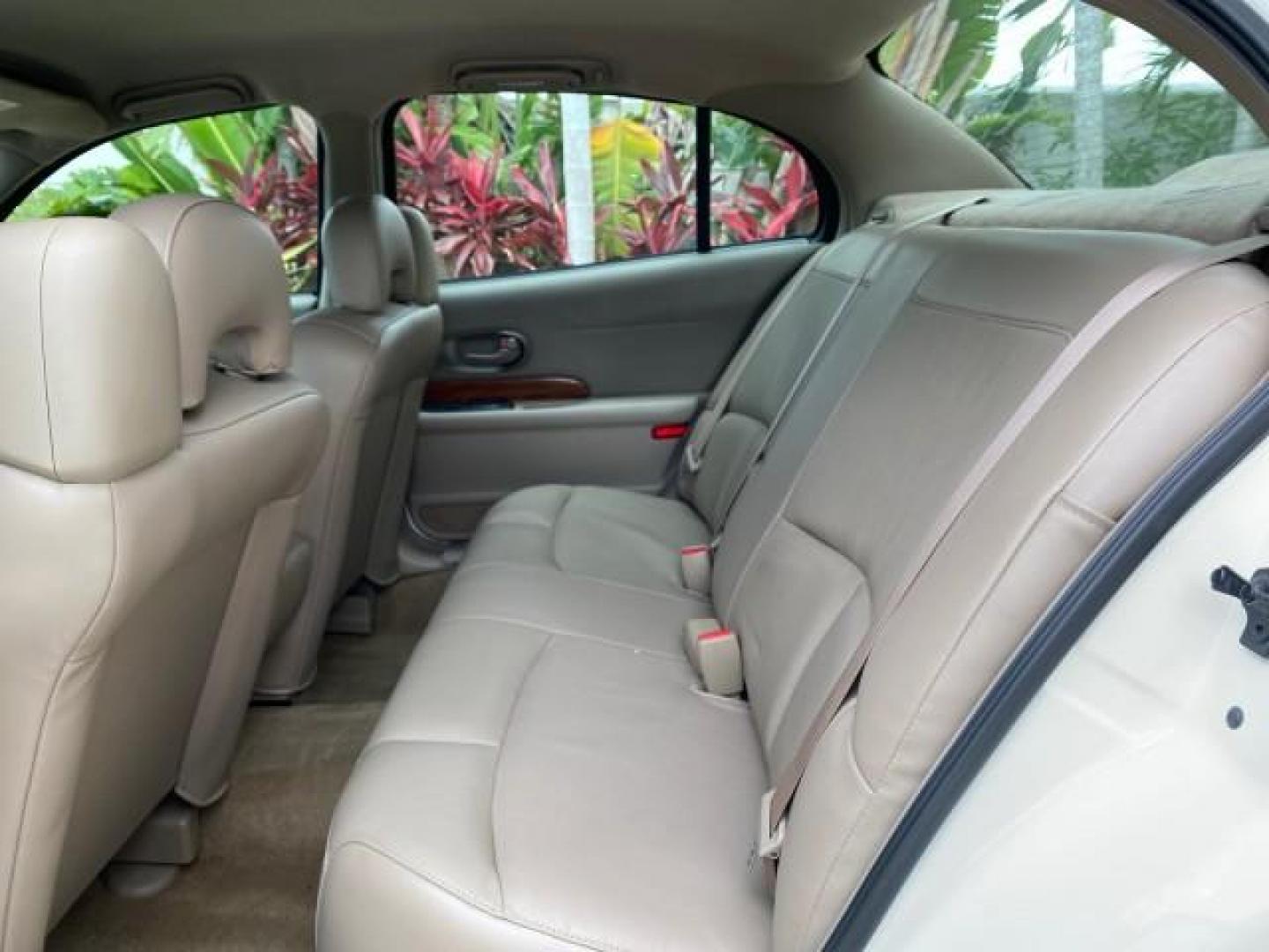 2003 White /Taupe Buick LeSabre LEATHER LOADED LOW MILES 25,425 (1G4HP52K034) with an 3.8L 3800 V6 SFI Engine engine, Automatic transmission, located at 4701 North Dixie Hwy, Pompano Beach, FL, 33064, (954) 422-2889, 26.240938, -80.123474 - OUR WEBPAGE FLORIDACARS1.COM HAS OVER 100 PHOTOS AND FREE CARFAX LINK 2003 Buick Lesabre Custom Sedan 4 DR 3.8L V6 F 12V Gasoline 29 MPG Front Wheel Drive Features ABS Brakes Air Conditioning AM/FM Stereo Automatic Transmission Cassette Player CD Audio Cruise Control Leather Seats Power Locks Power- Photo#73