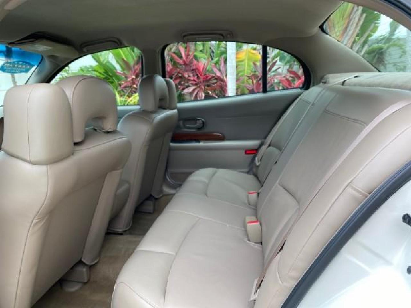 2003 White /Taupe Buick LeSabre LEATHER LOADED LOW MILES 25,425 (1G4HP52K034) with an 3.8L 3800 V6 SFI Engine engine, Automatic transmission, located at 4701 North Dixie Hwy, Pompano Beach, FL, 33064, (954) 422-2889, 26.240938, -80.123474 - OUR WEBPAGE FLORIDACARS1.COM HAS OVER 100 PHOTOS AND FREE CARFAX LINK 2003 Buick Lesabre Custom Sedan 4 DR 3.8L V6 F 12V Gasoline 29 MPG Front Wheel Drive Features ABS Brakes Air Conditioning AM/FM Stereo Automatic Transmission Cassette Player CD Audio Cruise Control Leather Seats Power Locks Power- Photo#74