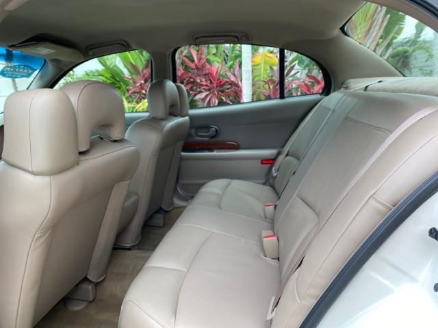 2003 White /Taupe Buick LeSabre LEATHER LOADED LOW MILES 25,425 (1G4HP52K034) with an 3.8L 3800 V6 SFI Engine engine, Automatic transmission, located at 4701 North Dixie Hwy, Pompano Beach, FL, 33064, (954) 422-2889, 26.240938, -80.123474 - OUR WEBPAGE FLORIDACARS1.COM HAS OVER 100 PHOTOS AND FREE CARFAX LINK 2003 Buick Lesabre Custom Sedan 4 DR 3.8L V6 F 12V Gasoline 29 MPG Front Wheel Drive Features ABS Brakes Air Conditioning AM/FM Stereo Automatic Transmission Cassette Player CD Audio Cruise Control Leather Seats Power Locks Power - Photo#74