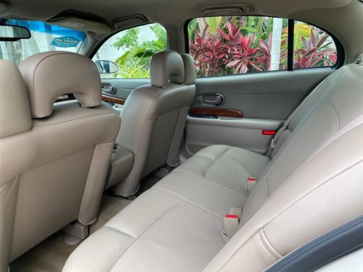 2003 White /Taupe Buick LeSabre LEATHER LOADED LOW MILES 25,425 (1G4HP52K034) with an 3.8L 3800 V6 SFI Engine engine, Automatic transmission, located at 4701 North Dixie Hwy, Pompano Beach, FL, 33064, (954) 422-2889, 26.240938, -80.123474 - OUR WEBPAGE FLORIDACARS1.COM HAS OVER 100 PHOTOS AND FREE CARFAX LINK 2003 Buick Lesabre Custom Sedan 4 DR 3.8L V6 F 12V Gasoline 29 MPG Front Wheel Drive Features ABS Brakes Air Conditioning AM/FM Stereo Automatic Transmission Cassette Player CD Audio Cruise Control Leather Seats Power Locks Power- Photo#75