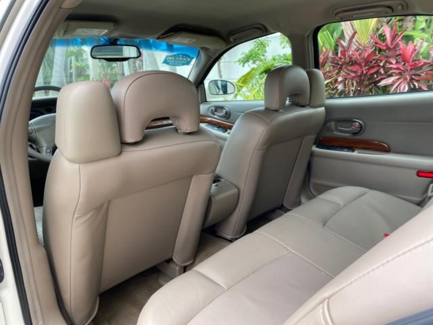 2003 White /Taupe Buick LeSabre LEATHER LOADED LOW MILES 25,425 (1G4HP52K034) with an 3.8L 3800 V6 SFI Engine engine, Automatic transmission, located at 4701 North Dixie Hwy, Pompano Beach, FL, 33064, (954) 422-2889, 26.240938, -80.123474 - OUR WEBPAGE FLORIDACARS1.COM HAS OVER 100 PHOTOS AND FREE CARFAX LINK 2003 Buick Lesabre Custom Sedan 4 DR 3.8L V6 F 12V Gasoline 29 MPG Front Wheel Drive Features ABS Brakes Air Conditioning AM/FM Stereo Automatic Transmission Cassette Player CD Audio Cruise Control Leather Seats Power Locks Power- Photo#76
