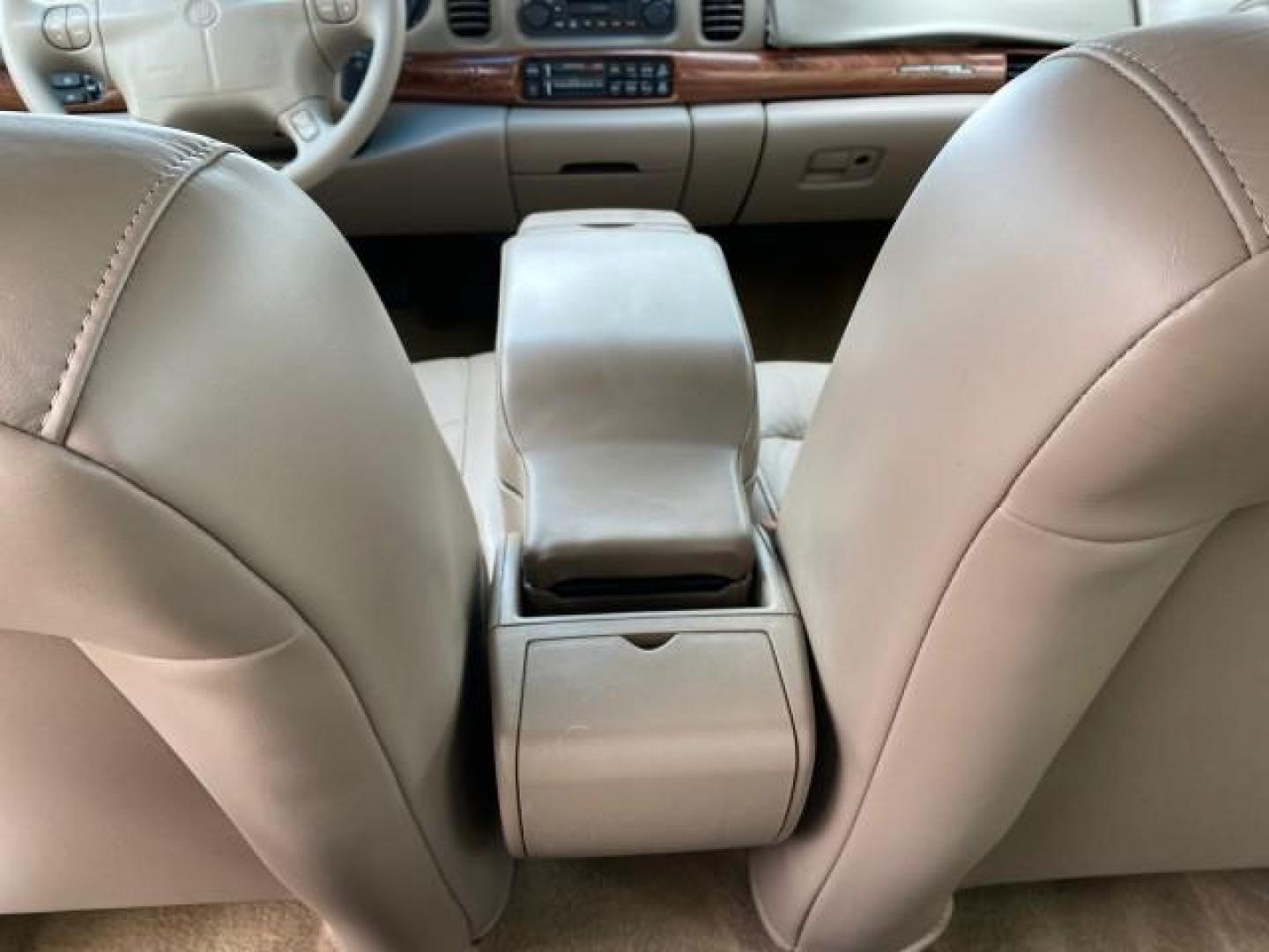 2003 White /Taupe Buick LeSabre LEATHER LOADED LOW MILES 25,425 (1G4HP52K034) with an 3.8L 3800 V6 SFI Engine engine, Automatic transmission, located at 4701 North Dixie Hwy, Pompano Beach, FL, 33064, (954) 422-2889, 26.240938, -80.123474 - OUR WEBPAGE FLORIDACARS1.COM HAS OVER 100 PHOTOS AND FREE CARFAX LINK 2003 Buick Lesabre Custom Sedan 4 DR 3.8L V6 F 12V Gasoline 29 MPG Front Wheel Drive Features ABS Brakes Air Conditioning AM/FM Stereo Automatic Transmission Cassette Player CD Audio Cruise Control Leather Seats Power Locks Power- Photo#77