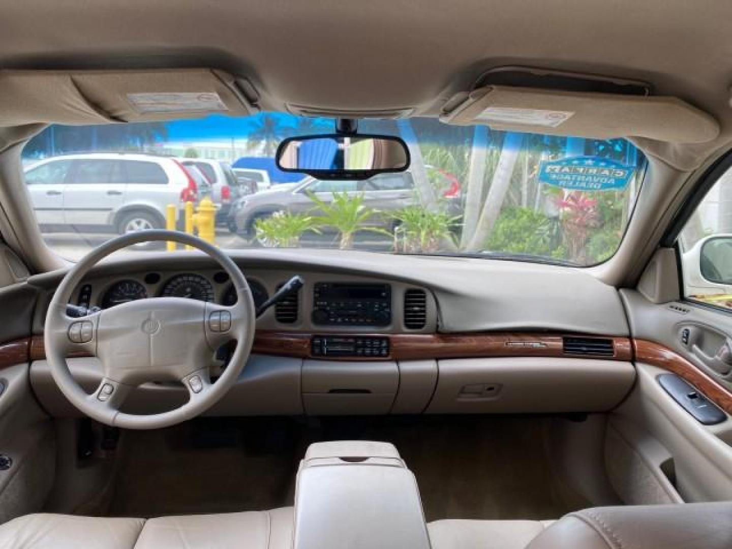 2003 White /Taupe Buick LeSabre LEATHER LOADED LOW MILES 25,425 (1G4HP52K034) with an 3.8L 3800 V6 SFI Engine engine, Automatic transmission, located at 4701 North Dixie Hwy, Pompano Beach, FL, 33064, (954) 422-2889, 26.240938, -80.123474 - OUR WEBPAGE FLORIDACARS1.COM HAS OVER 100 PHOTOS AND FREE CARFAX LINK 2003 Buick Lesabre Custom Sedan 4 DR 3.8L V6 F 12V Gasoline 29 MPG Front Wheel Drive Features ABS Brakes Air Conditioning AM/FM Stereo Automatic Transmission Cassette Player CD Audio Cruise Control Leather Seats Power Locks Power- Photo#78