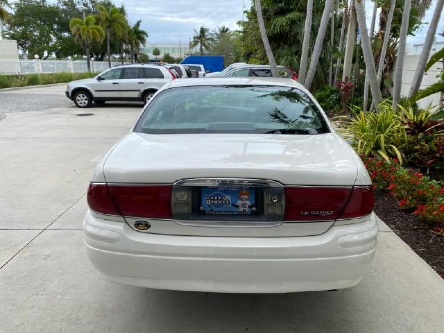 2003 White /Taupe Buick LeSabre LEATHER LOADED LOW MILES 25,425 (1G4HP52K034) with an 3.8L 3800 V6 SFI Engine engine, Automatic transmission, located at 4701 North Dixie Hwy, Pompano Beach, FL, 33064, (954) 422-2889, 26.240938, -80.123474 - OUR WEBPAGE FLORIDACARS1.COM HAS OVER 100 PHOTOS AND FREE CARFAX LINK 2003 Buick Lesabre Custom Sedan 4 DR 3.8L V6 F 12V Gasoline 29 MPG Front Wheel Drive Features ABS Brakes Air Conditioning AM/FM Stereo Automatic Transmission Cassette Player CD Audio Cruise Control Leather Seats Power Locks Power- Photo#85