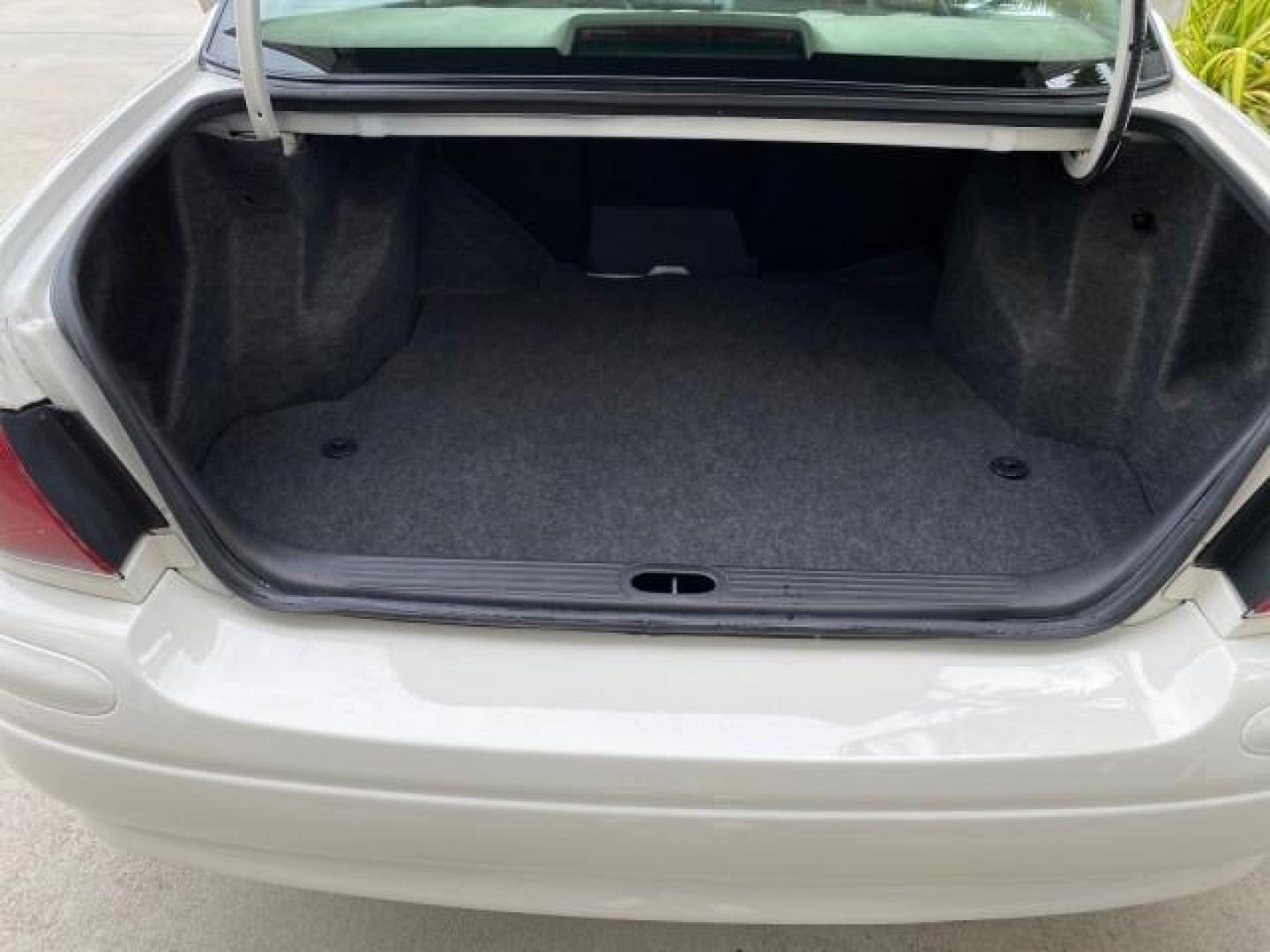 2003 White /Taupe Buick LeSabre LEATHER LOADED LOW MILES 25,425 (1G4HP52K034) with an 3.8L 3800 V6 SFI Engine engine, Automatic transmission, located at 4701 North Dixie Hwy, Pompano Beach, FL, 33064, (954) 422-2889, 26.240938, -80.123474 - OUR WEBPAGE FLORIDACARS1.COM HAS OVER 100 PHOTOS AND FREE CARFAX LINK 2003 Buick Lesabre Custom Sedan 4 DR 3.8L V6 F 12V Gasoline 29 MPG Front Wheel Drive Features ABS Brakes Air Conditioning AM/FM Stereo Automatic Transmission Cassette Player CD Audio Cruise Control Leather Seats Power Locks Power- Photo#90