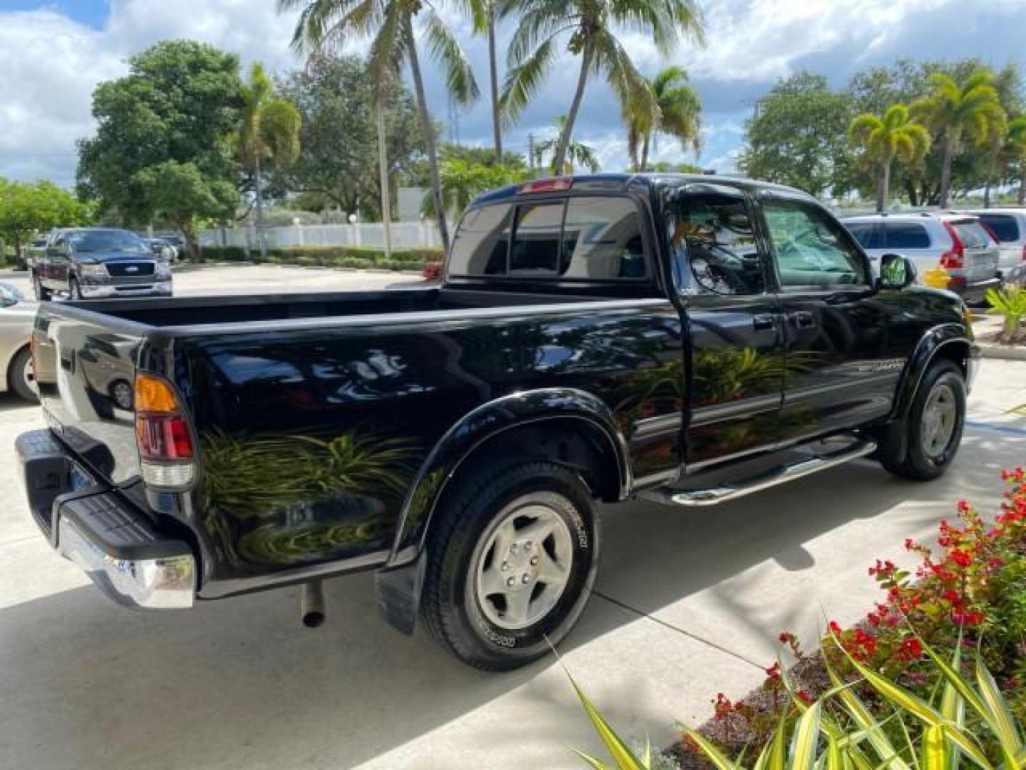 2002 Black /Oak Toyota Tundra ACCESS SR5 LEATHER LOW MILES 90,481 (5TBRN34102S) with an 3.4L DOHC EFI 24-Valve V6 Engine engine, Automatic transmission, located at 4701 North Dixie Hwy, Pompano Beach, FL, 33064, (954) 422-2889, 26.240938, -80.123474 - OUR WEBPAGE FLORIDACARS1.COM HAS OVER 100 PHOTOS AND FREE CARFAX LINK 2002 Toyota Tundra SR5 4 Door Extended Cab Pickup 3.4L V6 F DOHC 24V Gasoline 20 MPG Rear Wheel Drive Features ABS Brakes Air Conditioning Alloy Wheels AM/FM Stereo Automatic Transmission Bed Liner CD Audio Cruise Control Leather- Photo#7