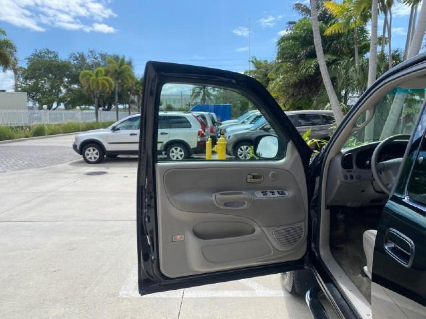 2002 Black /Oak Toyota Tundra ACCESS SR5 LEATHER LOW MILES 90,481 (5TBRN34102S) with an 3.4L DOHC EFI 24-Valve V6 Engine engine, Automatic transmission, located at 4701 North Dixie Hwy, Pompano Beach, FL, 33064, (954) 422-2889, 26.240938, -80.123474 - OUR WEBPAGE FLORIDACARS1.COM HAS OVER 100 PHOTOS AND FREE CARFAX LINK 2002 Toyota Tundra SR5 4 Door Extended Cab Pickup 3.4L V6 F DOHC 24V Gasoline 20 MPG Rear Wheel Drive Features ABS Brakes Air Conditioning Alloy Wheels AM/FM Stereo Automatic Transmission Bed Liner CD Audio Cruise Control Leather- Photo#9