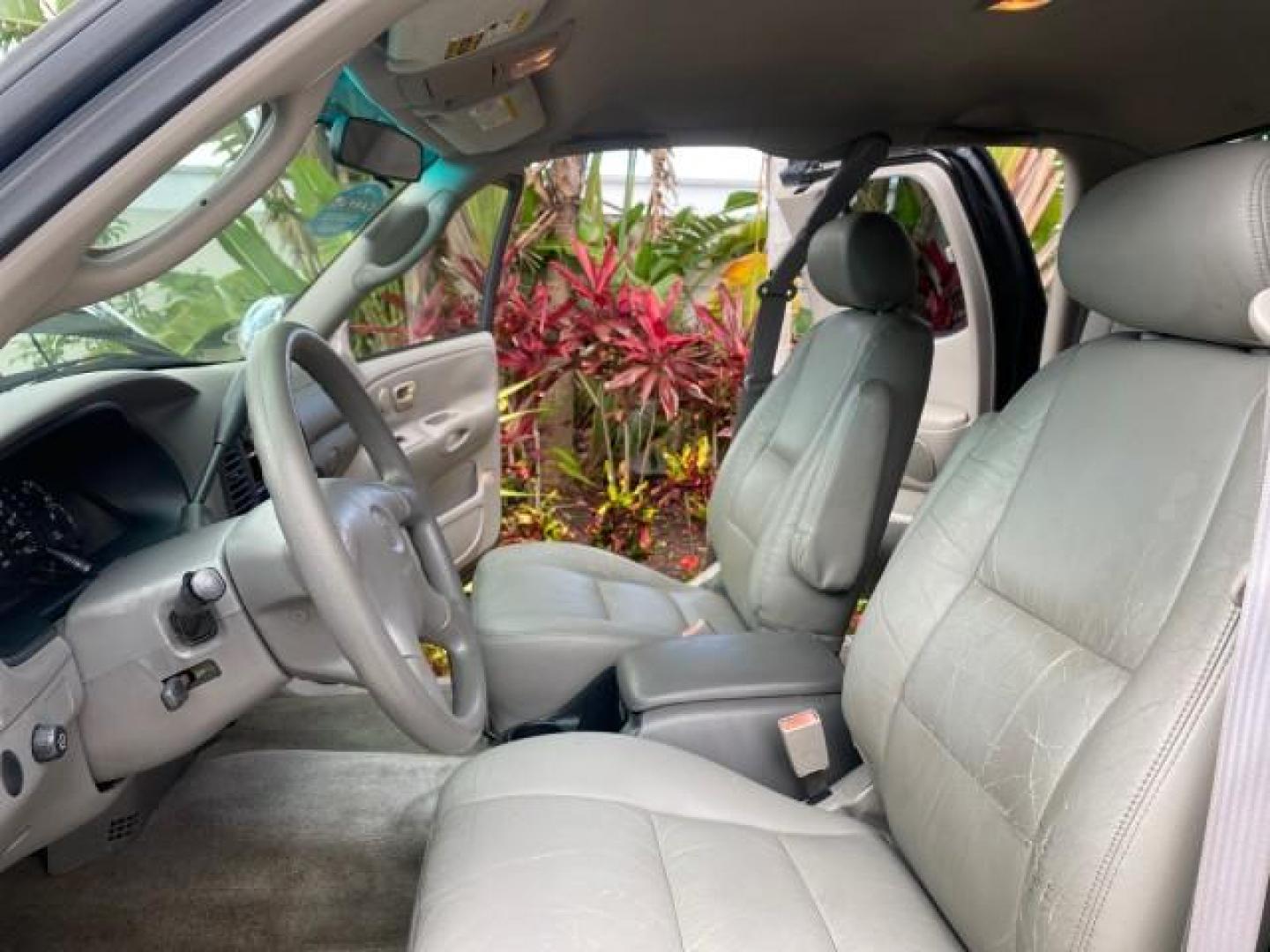 2002 Black /Oak Toyota Tundra ACCESS SR5 LEATHER LOW MILES 90,481 (5TBRN34102S) with an 3.4L DOHC EFI 24-Valve V6 Engine engine, Automatic transmission, located at 4701 North Dixie Hwy, Pompano Beach, FL, 33064, (954) 422-2889, 26.240938, -80.123474 - OUR WEBPAGE FLORIDACARS1.COM HAS OVER 100 PHOTOS AND FREE CARFAX LINK 2002 Toyota Tundra SR5 4 Door Extended Cab Pickup 3.4L V6 F DOHC 24V Gasoline 20 MPG Rear Wheel Drive Features ABS Brakes Air Conditioning Alloy Wheels AM/FM Stereo Automatic Transmission Bed Liner CD Audio Cruise Control Leather- Photo#10