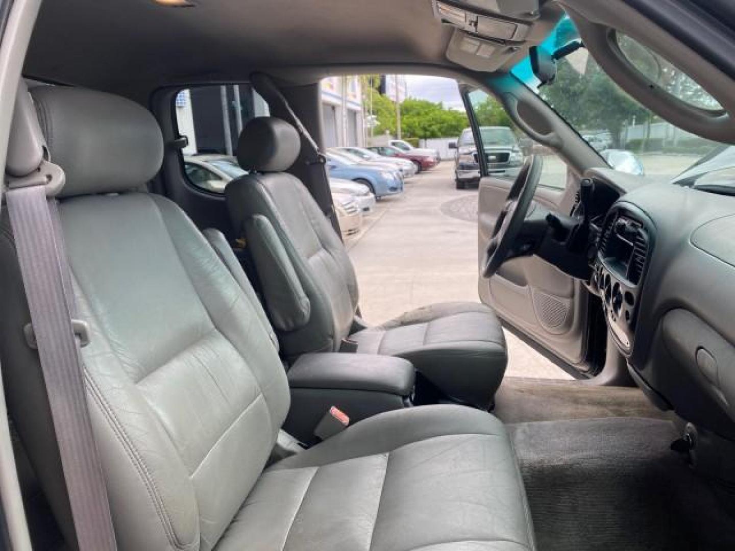 2002 Black /Oak Toyota Tundra ACCESS SR5 LEATHER LOW MILES 90,481 (5TBRN34102S) with an 3.4L DOHC EFI 24-Valve V6 Engine engine, Automatic transmission, located at 4701 North Dixie Hwy, Pompano Beach, FL, 33064, (954) 422-2889, 26.240938, -80.123474 - OUR WEBPAGE FLORIDACARS1.COM HAS OVER 100 PHOTOS AND FREE CARFAX LINK 2002 Toyota Tundra SR5 4 Door Extended Cab Pickup 3.4L V6 F DOHC 24V Gasoline 20 MPG Rear Wheel Drive Features ABS Brakes Air Conditioning Alloy Wheels AM/FM Stereo Automatic Transmission Bed Liner CD Audio Cruise Control Leather- Photo#12