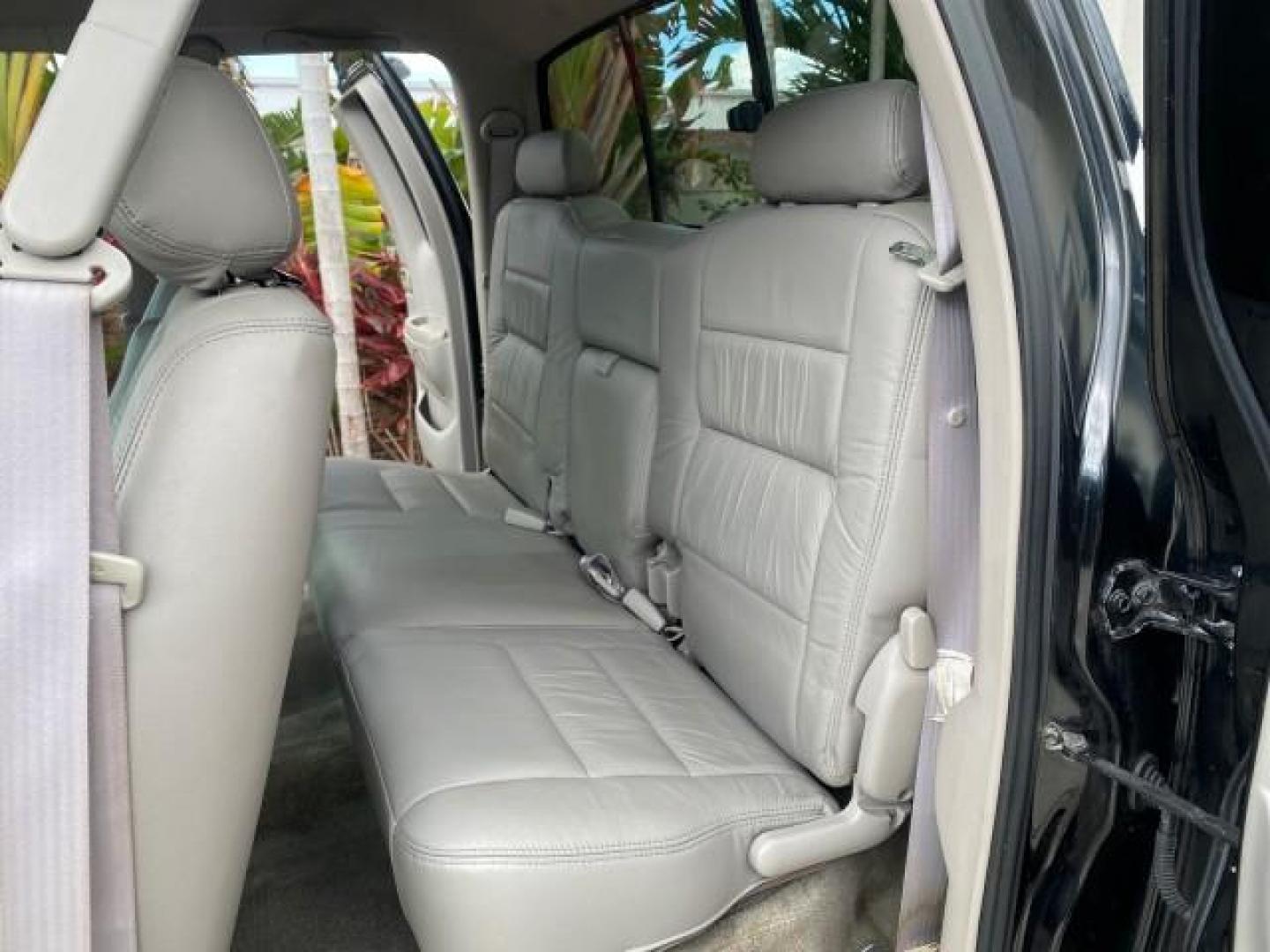 2002 Black /Oak Toyota Tundra ACCESS SR5 LEATHER LOW MILES 90,481 (5TBRN34102S) with an 3.4L DOHC EFI 24-Valve V6 Engine engine, Automatic transmission, located at 4701 North Dixie Hwy, Pompano Beach, FL, 33064, (954) 422-2889, 26.240938, -80.123474 - OUR WEBPAGE FLORIDACARS1.COM HAS OVER 100 PHOTOS AND FREE CARFAX LINK 2002 Toyota Tundra SR5 4 Door Extended Cab Pickup 3.4L V6 F DOHC 24V Gasoline 20 MPG Rear Wheel Drive Features ABS Brakes Air Conditioning Alloy Wheels AM/FM Stereo Automatic Transmission Bed Liner CD Audio Cruise Control Leather- Photo#14