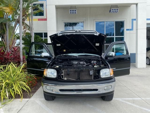 2002 Black /Oak Toyota Tundra ACCESS SR5 LEATHER LOW MILES 90,481 (5TBRN34102S) with an 3.4L DOHC EFI 24-Valve V6 Engine engine, Automatic transmission, located at 4701 North Dixie Hwy, Pompano Beach, FL, 33064, (954) 422-2889, 26.240938, -80.123474 - OUR WEBPAGE FLORIDACARS1.COM HAS OVER 100 PHOTOS AND FREE CARFAX LINK 2002 Toyota Tundra SR5 4 Door Extended Cab Pickup 3.4L V6 F DOHC 24V Gasoline 20 MPG Rear Wheel Drive Features ABS Brakes Air Conditioning Alloy Wheels AM/FM Stereo Automatic Transmission Bed Liner CD Audio Cruise Control Leather - Photo#16