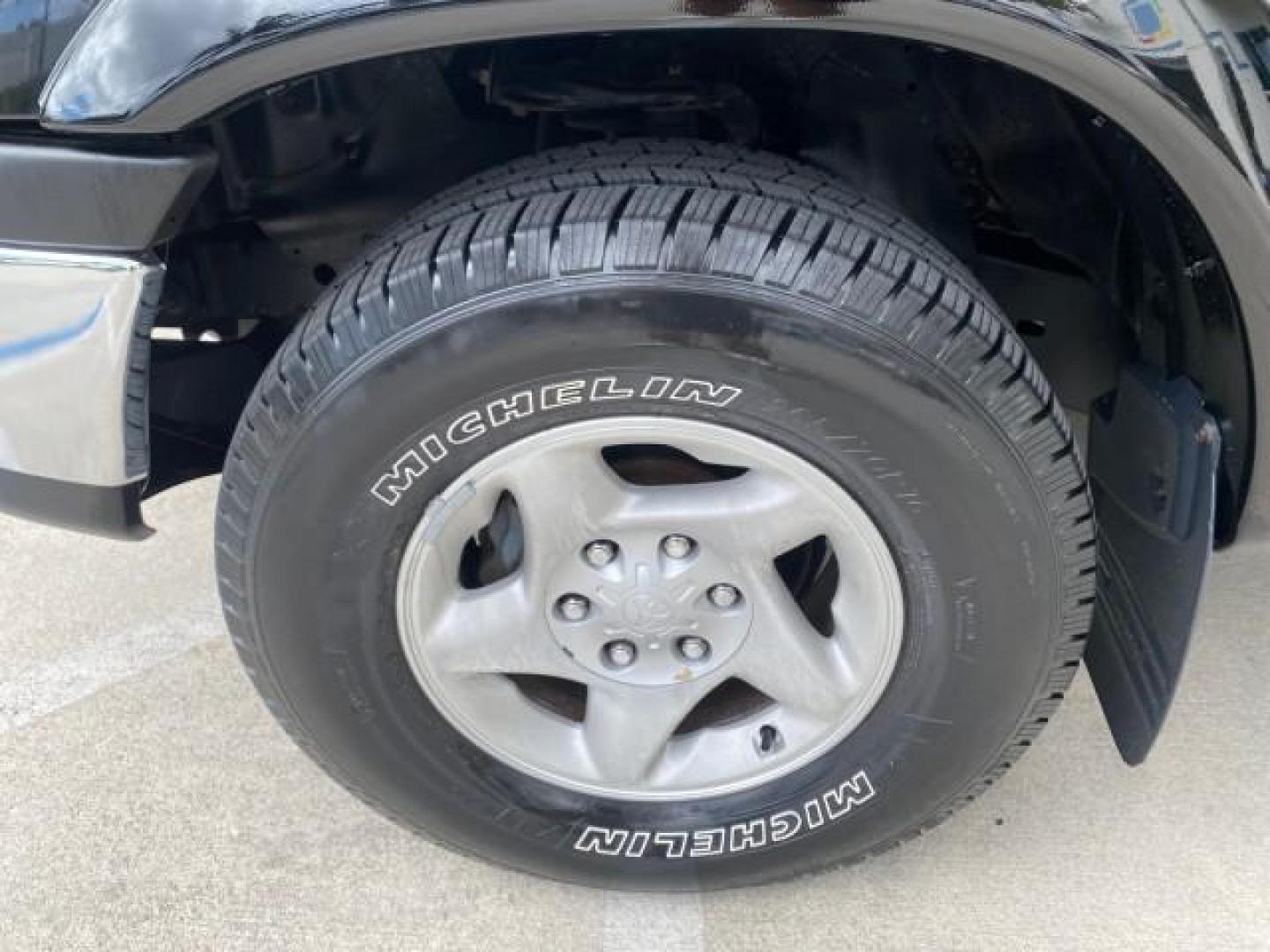 2002 Black /Oak Toyota Tundra ACCESS SR5 LEATHER LOW MILES 90,481 (5TBRN34102S) with an 3.4L DOHC EFI 24-Valve V6 Engine engine, Automatic transmission, located at 4701 North Dixie Hwy, Pompano Beach, FL, 33064, (954) 422-2889, 26.240938, -80.123474 - OUR WEBPAGE FLORIDACARS1.COM HAS OVER 100 PHOTOS AND FREE CARFAX LINK 2002 Toyota Tundra SR5 4 Door Extended Cab Pickup 3.4L V6 F DOHC 24V Gasoline 20 MPG Rear Wheel Drive Features ABS Brakes Air Conditioning Alloy Wheels AM/FM Stereo Automatic Transmission Bed Liner CD Audio Cruise Control Leather- Photo#19