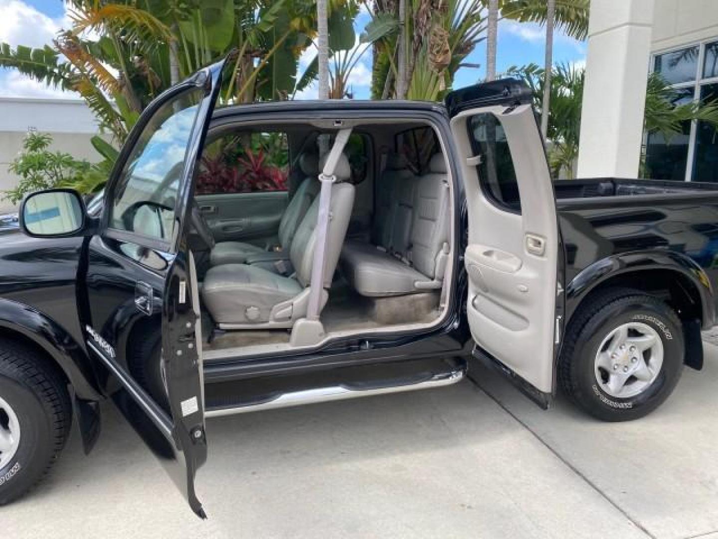 2002 Black /Oak Toyota Tundra ACCESS SR5 LEATHER LOW MILES 90,481 (5TBRN34102S) with an 3.4L DOHC EFI 24-Valve V6 Engine engine, Automatic transmission, located at 4701 North Dixie Hwy, Pompano Beach, FL, 33064, (954) 422-2889, 26.240938, -80.123474 - OUR WEBPAGE FLORIDACARS1.COM HAS OVER 100 PHOTOS AND FREE CARFAX LINK 2002 Toyota Tundra SR5 4 Door Extended Cab Pickup 3.4L V6 F DOHC 24V Gasoline 20 MPG Rear Wheel Drive Features ABS Brakes Air Conditioning Alloy Wheels AM/FM Stereo Automatic Transmission Bed Liner CD Audio Cruise Control Leather- Photo#73