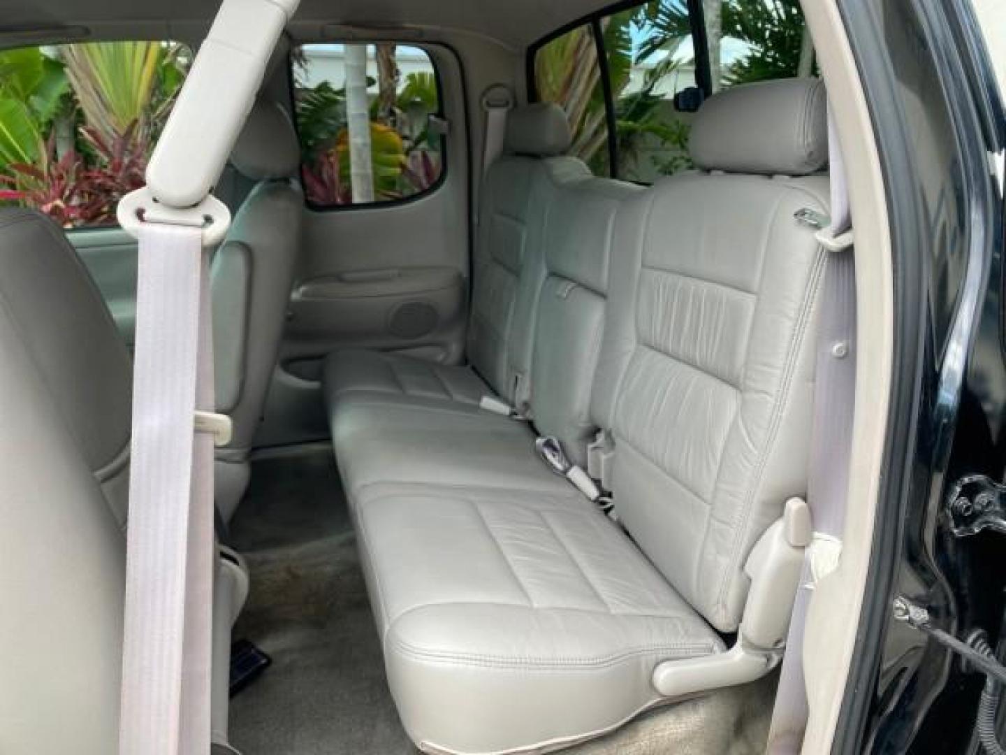 2002 Black /Oak Toyota Tundra ACCESS SR5 LEATHER LOW MILES 90,481 (5TBRN34102S) with an 3.4L DOHC EFI 24-Valve V6 Engine engine, Automatic transmission, located at 4701 North Dixie Hwy, Pompano Beach, FL, 33064, (954) 422-2889, 26.240938, -80.123474 - OUR WEBPAGE FLORIDACARS1.COM HAS OVER 100 PHOTOS AND FREE CARFAX LINK 2002 Toyota Tundra SR5 4 Door Extended Cab Pickup 3.4L V6 F DOHC 24V Gasoline 20 MPG Rear Wheel Drive Features ABS Brakes Air Conditioning Alloy Wheels AM/FM Stereo Automatic Transmission Bed Liner CD Audio Cruise Control Leather- Photo#75